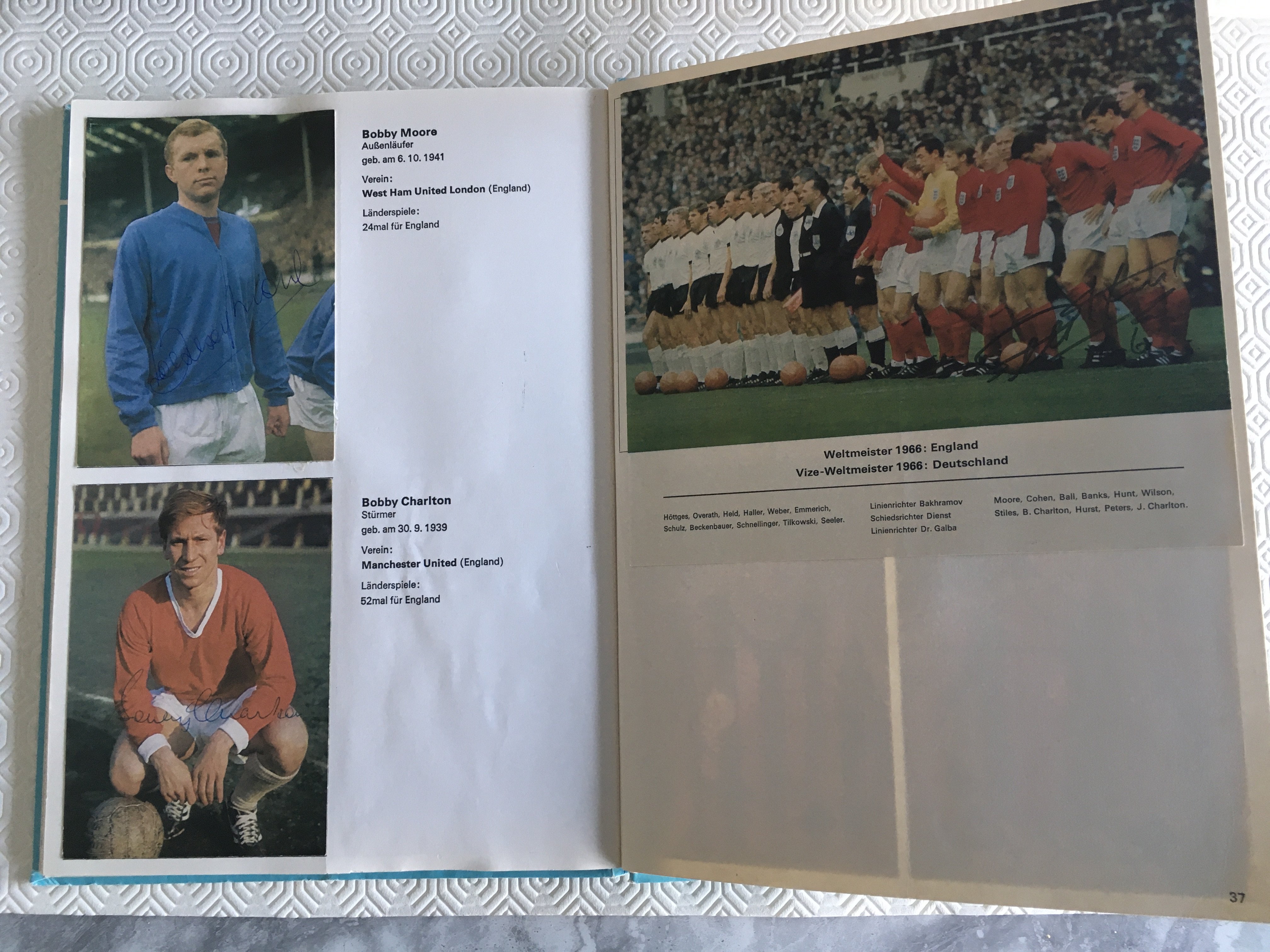 1966 World Cup Signed Football Card Album: Aral Fussball Album Weltmeisterschaft 1966. Not only signed by all 26 German players but also by the 10 other biggest names in the World Cup which include Bobby Moore, Bobby Charlton, Pele and Eusebio. If you are familiar with this hardbacked large card set, you will know there is a line up picture of both teams of the final, which is signed by hat trick goalscorer Geoff Hirst. Stunning, genuine, fully signed album.