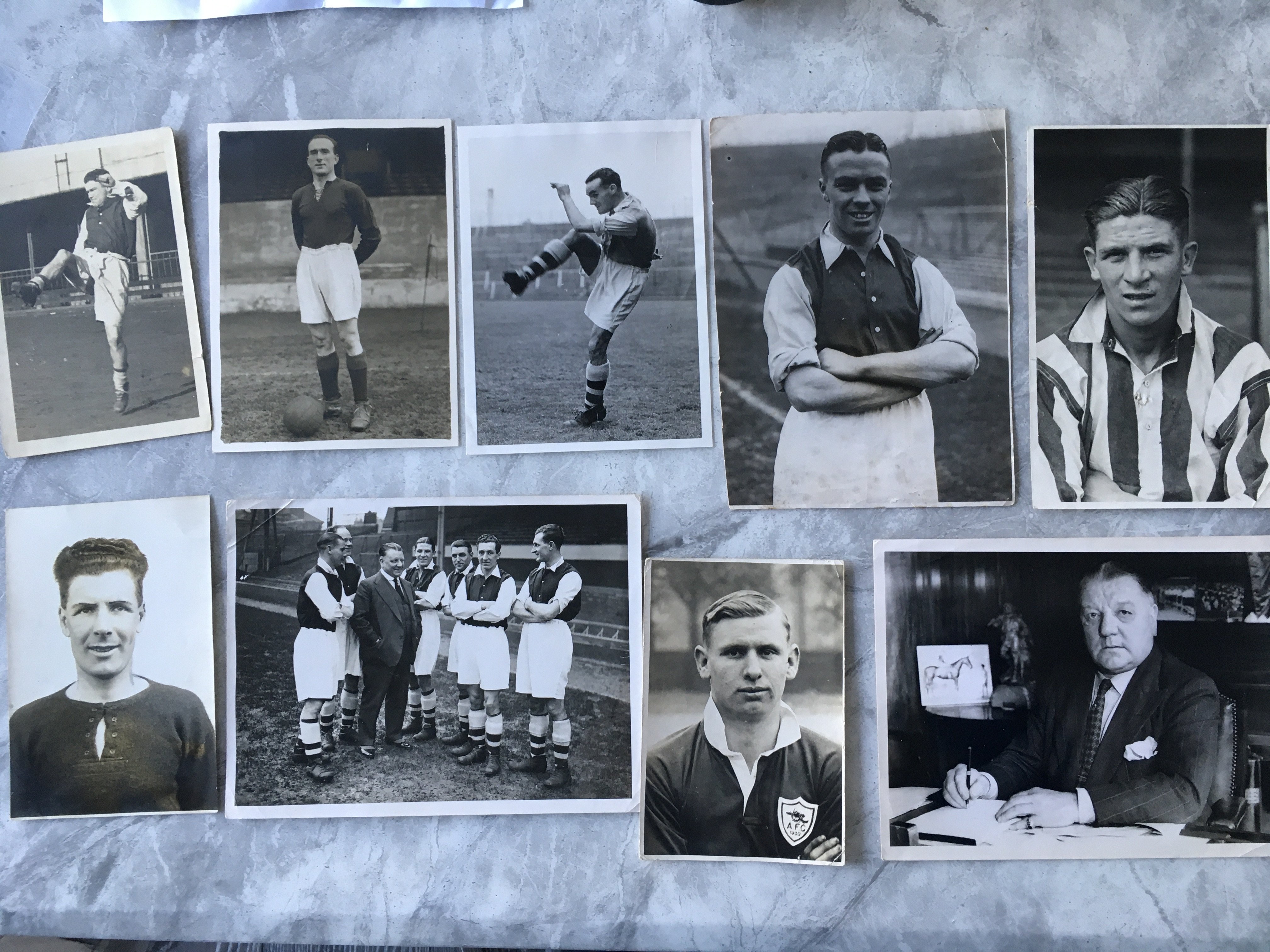 Arsenal Pre War Football Press Photos: Lovely shot of manager George Allison with 6 players in Arsenal kit, James Ramsey mid 20s, Parker 1932, Bastin, Davidson and more. Various sizes the smallest being postcard size. Mainly good all with press stamps to rear. (9)