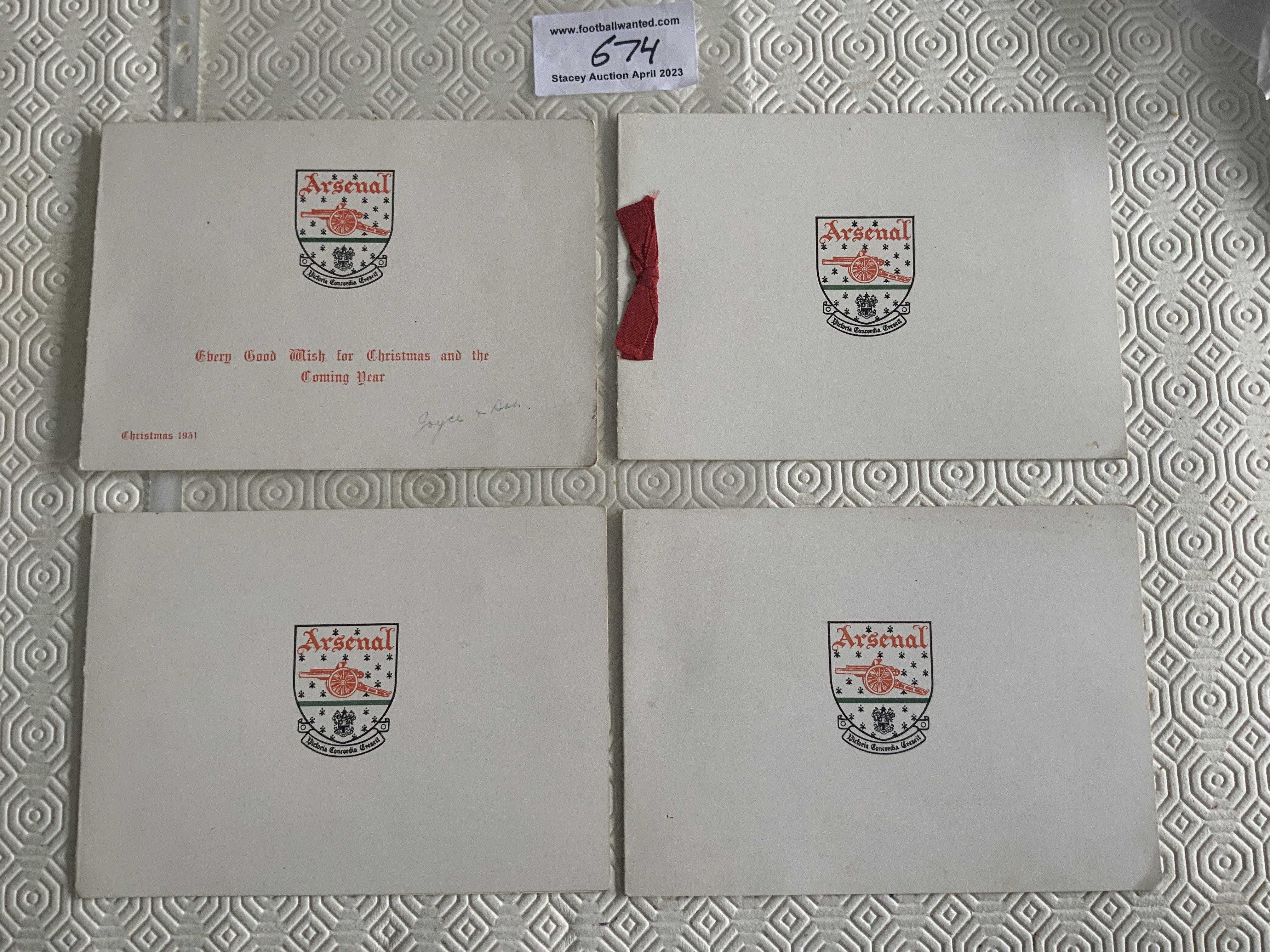 1950s Arsenal Christmas Cards: Cards from 1951 1956 and two the same which has a picture of Arsenal coming off the pitch in Moscow. Nice items issued by the club and never for sale. (4)