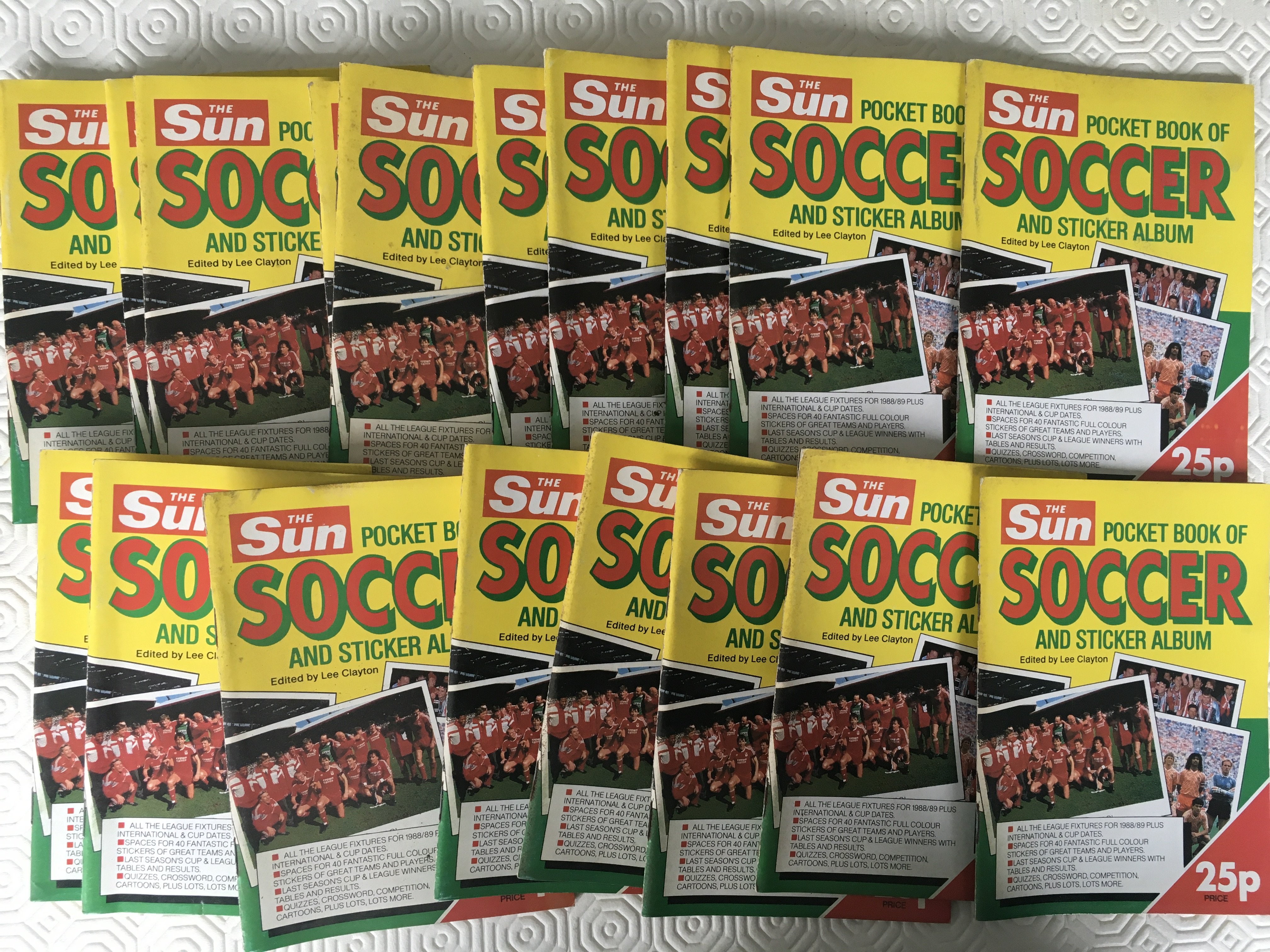 The Sun Shop Display Football Card Sets: Pocket Book Of Soccer small empty albums x 18. C/W box featuring Lineker in England kit containing 15 x set 1, 15 x set 2, 14 set 3 and 15 set 4. You need a set of 4 to complete a book which contain 10 cards in each set. Display box has tears and you could make 14 complete sets of 40 with accompanying albums. Rare chance.