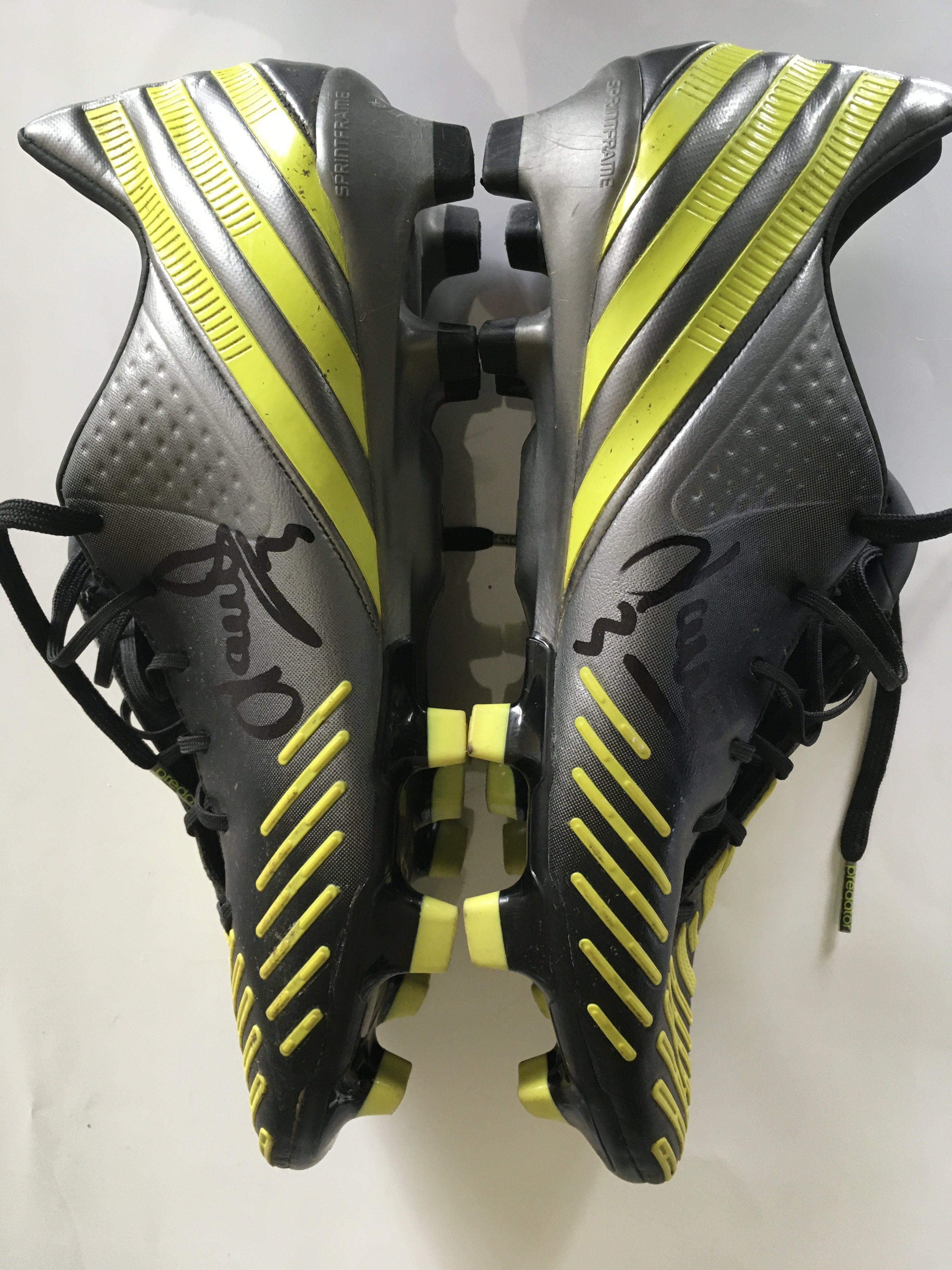Leighton Baines Everton Signed Football Boots: Adidas Predator grey boots with yellow design and studs. Given to vendor directly by Baines who has signed both boots. Whilst excellent they have been worn but Leighton did not specify if he wore them in a match so will be sold as player issue. U.K. size 6.5.