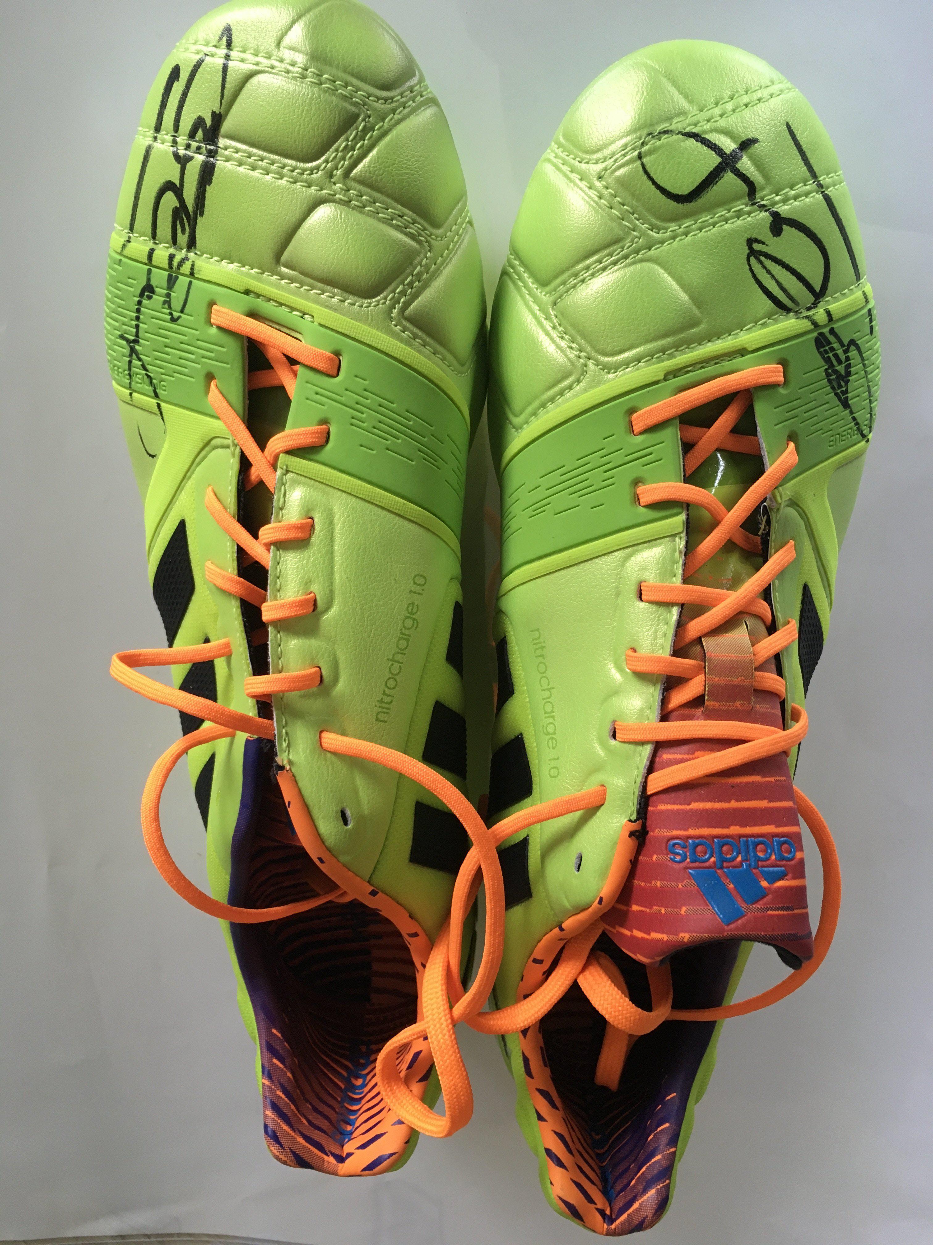 Steve Gerrard Liverpool + England Signed Football Boots: Lime green Adidas Nitrocharge 1.0 pair of boots signed on both by Gerrard. Given to vendor directly from Gerrard who wore this style but not this pair as they are unused and not personalised.