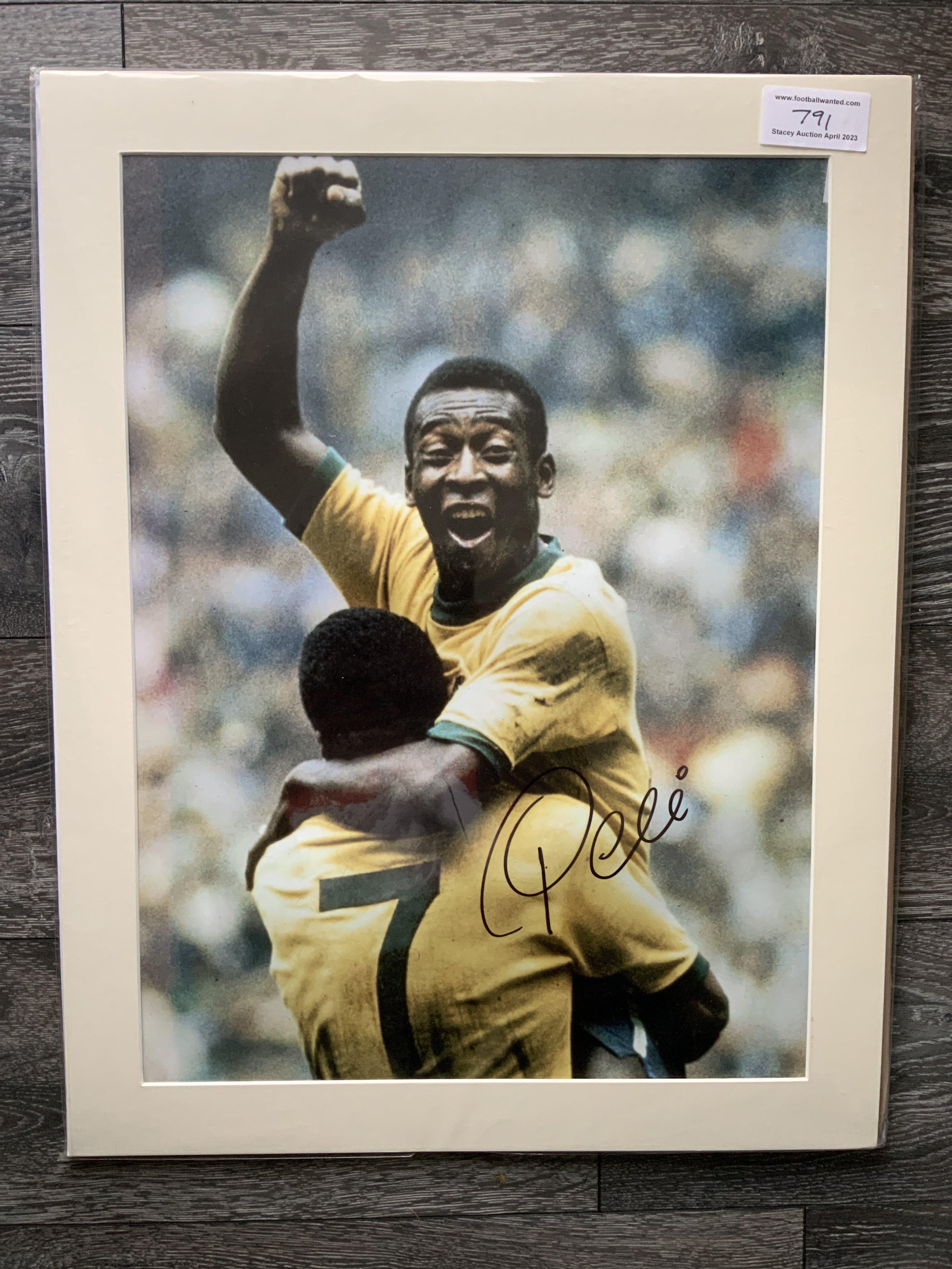 Pele Signed Brazil Football Print: In mount measuring 27 x 20 inches with COA from leading dealer A1 Sporting Memorabilia. Depicts Pele celebrating goal.