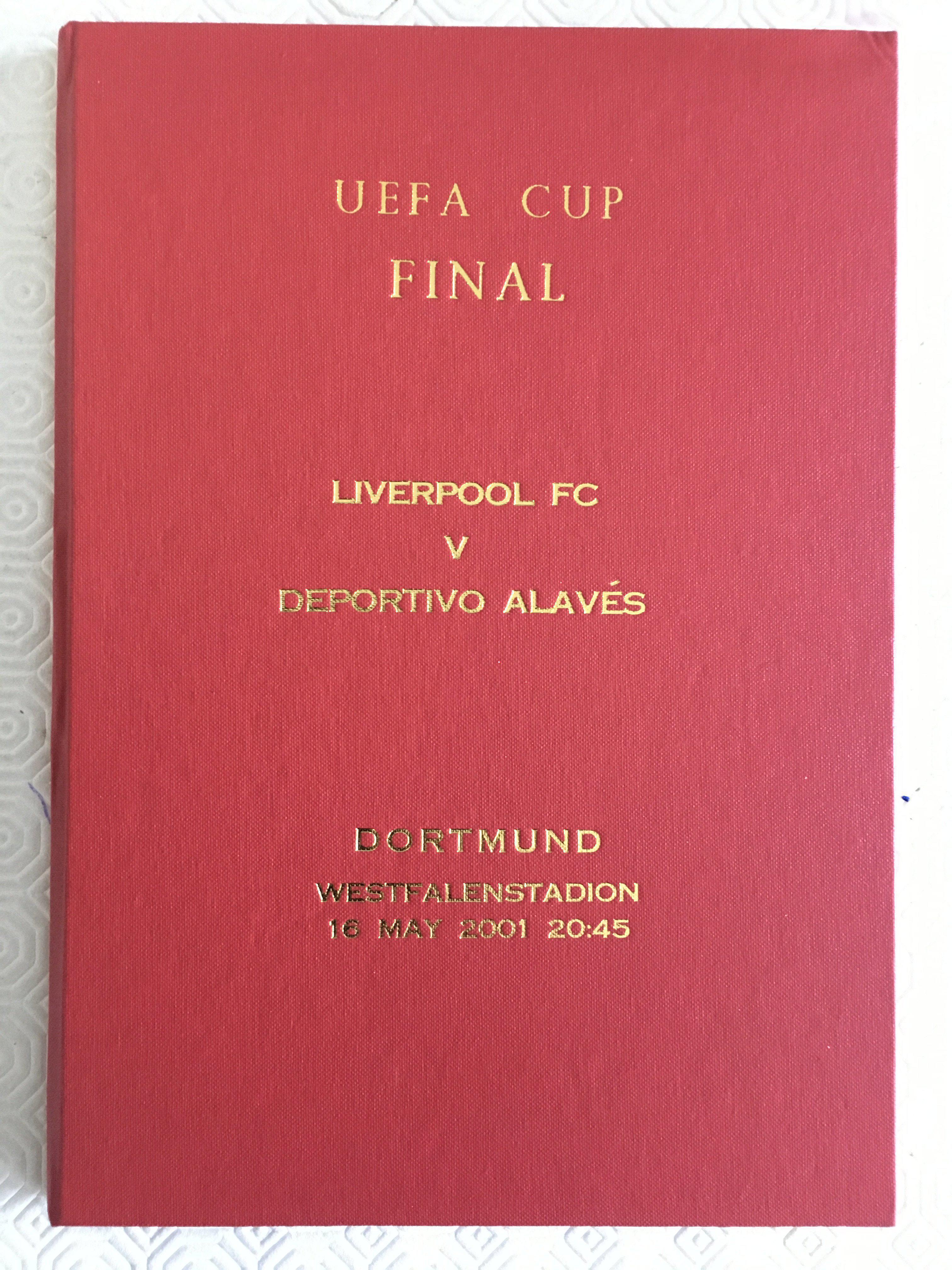 2001 Liverpool v Alaves Hardback Signed Final Programme: Red UEFA Cup final hand signed by the entire Liverpool squad that day. Numbered 1-23 for players with space for Houllier + Thompson of official sheet stuck in. 100 per cent genuine with every player identified. Who could forget that amazing 5-4 victory for Liverpool.