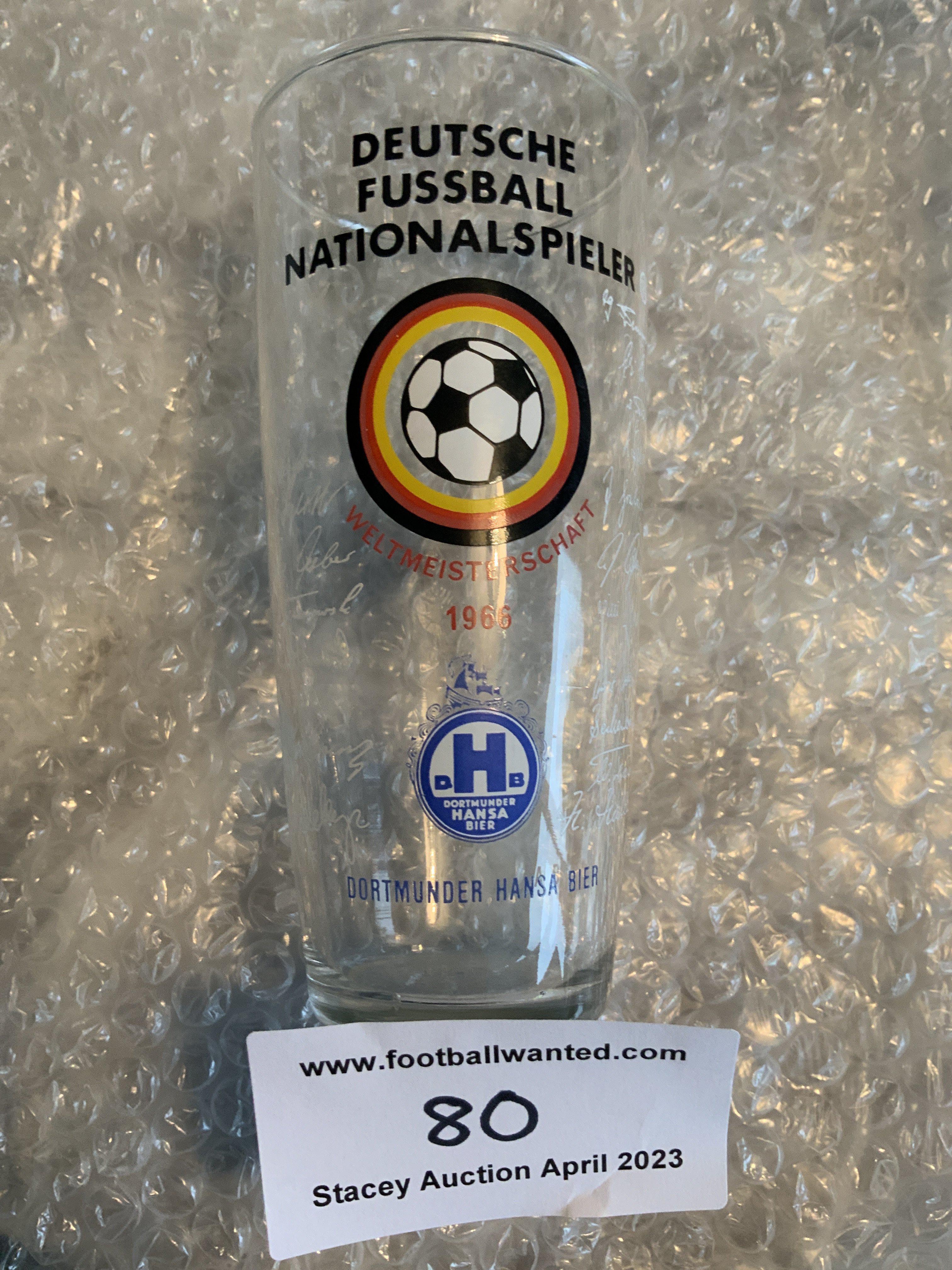1966 World Cup Germany Drinking Glass: Attractive half pint glass with an etched autograph of the German squad. Underneath a football with German colour surround are the words Weltermeisterschaftb1966. Good condition original 1966 item from the finalists.