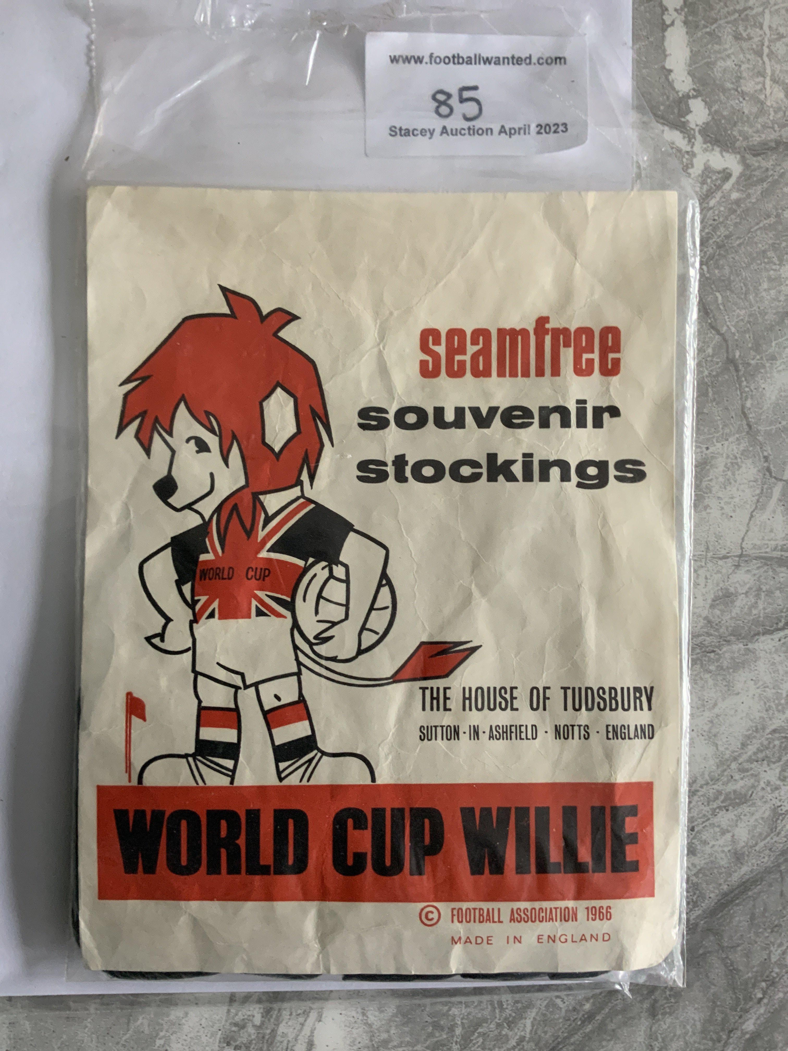 1966 World Cup Willie Stockings + Knitting Patterns: Pair of stockings in original packaging featuring WC Willie advertising the seam free souvenir stockings, made by the House of Tudsbury. C/W knitting patterns one to make a WC Willie blazer badge, the other to make a car cushion and WC Willie doll. Nice items. (3)