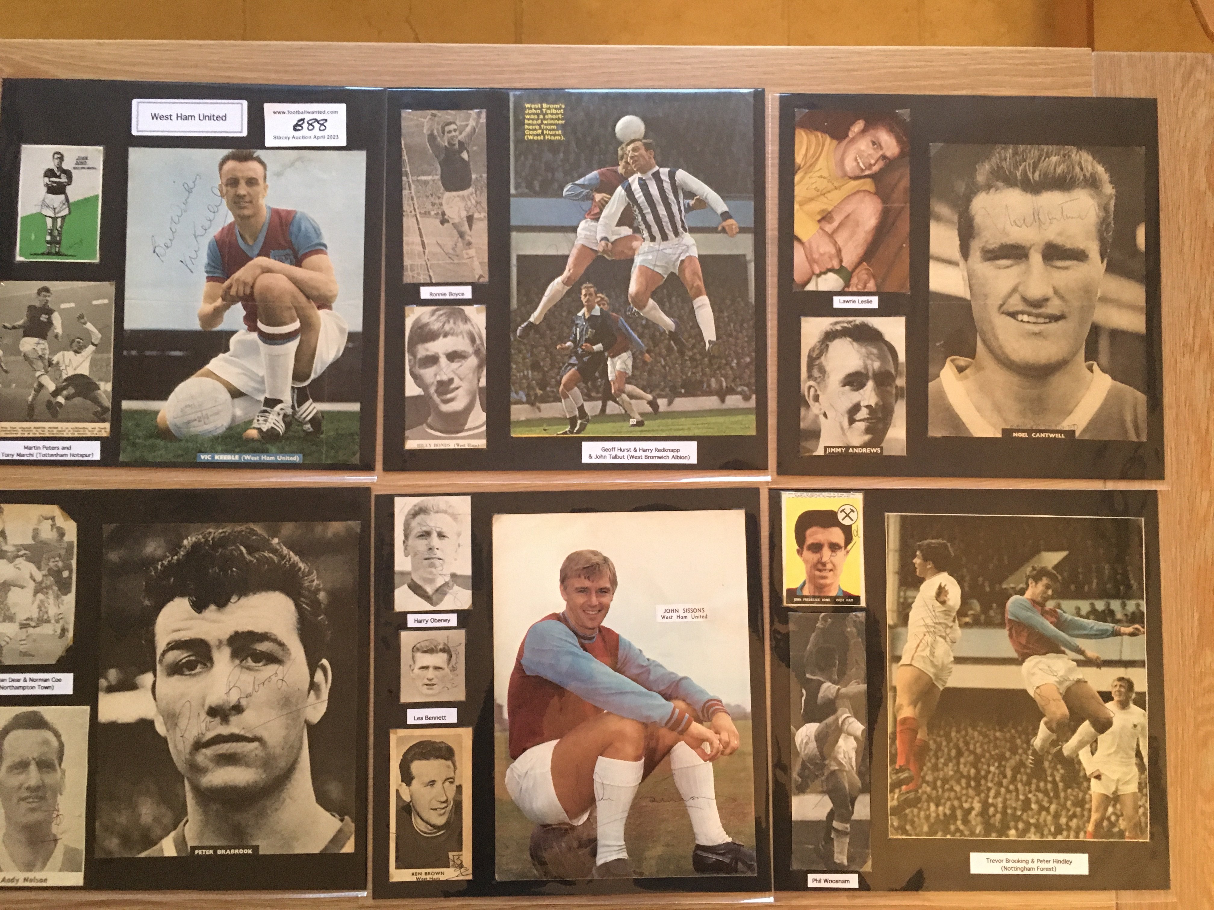 West Ham 1940s 1950s 1960s Football Autograph Collection: Stunning private collection all pre 1970 from various publications. All signatures are identified and laid down with photo corners on 12 x 12 inch card and easily removable. 54 pages to include 1 fully signed team group, 11 signed trade cards including large Typhoo Tea cards signed by Bobby Moore, Martin Peters & Geoff Hurst, 5 signed autograph pages, 13 signed original press photos and 214 various sized pictures to include 29 A4. 105 different player signatures including Bobby Moore x 6, Ron Brett, Len Goulden, Steve D'eath, Brian Dear, Alan Sealey, Noel Cantwell, Eddie Presland, Johnny Byrne, Billy Bonds, Ron Greenwood, John Charles, Malcolm Pyke etc. (350+)