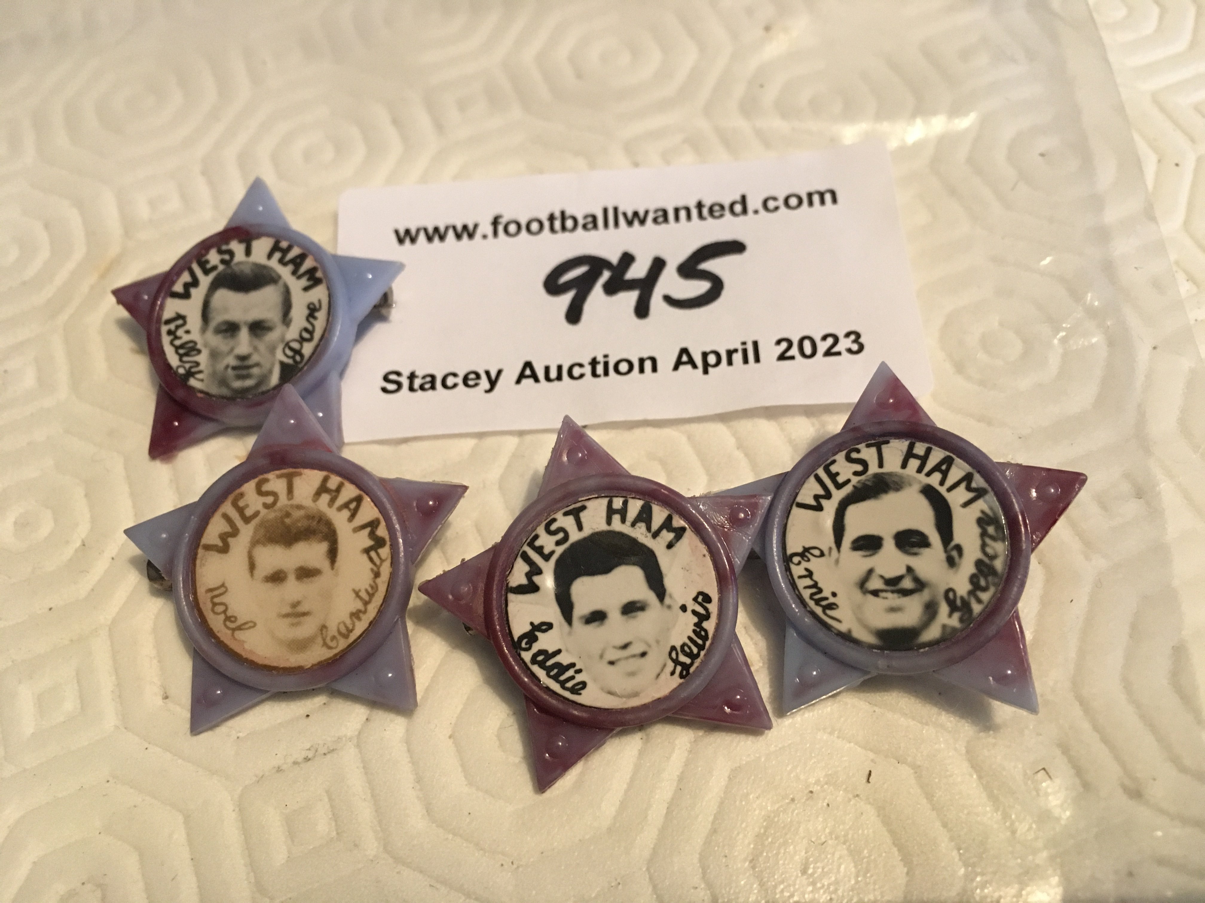 West Ham Football Star Badges: In the shape of a claret and blue star with a circular black and white picture to middle. Players include Ernie Gregory, Eddie Lewis, Billy Dare and Noel Cantwell. (4)