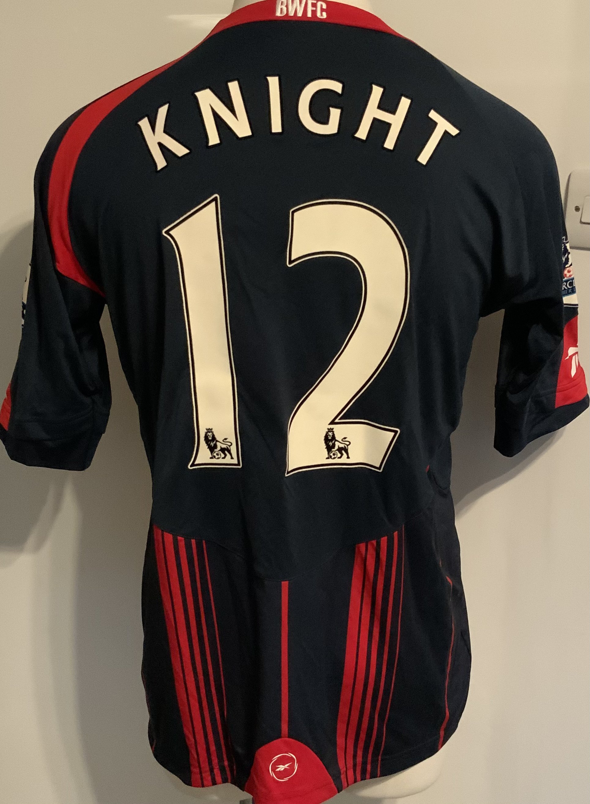 Bolton Wanderers 2009 - 2010 Match Worn Football Shirt: Blue short sleeve with Premiership badging to arms. Number 12 Knight to rear.