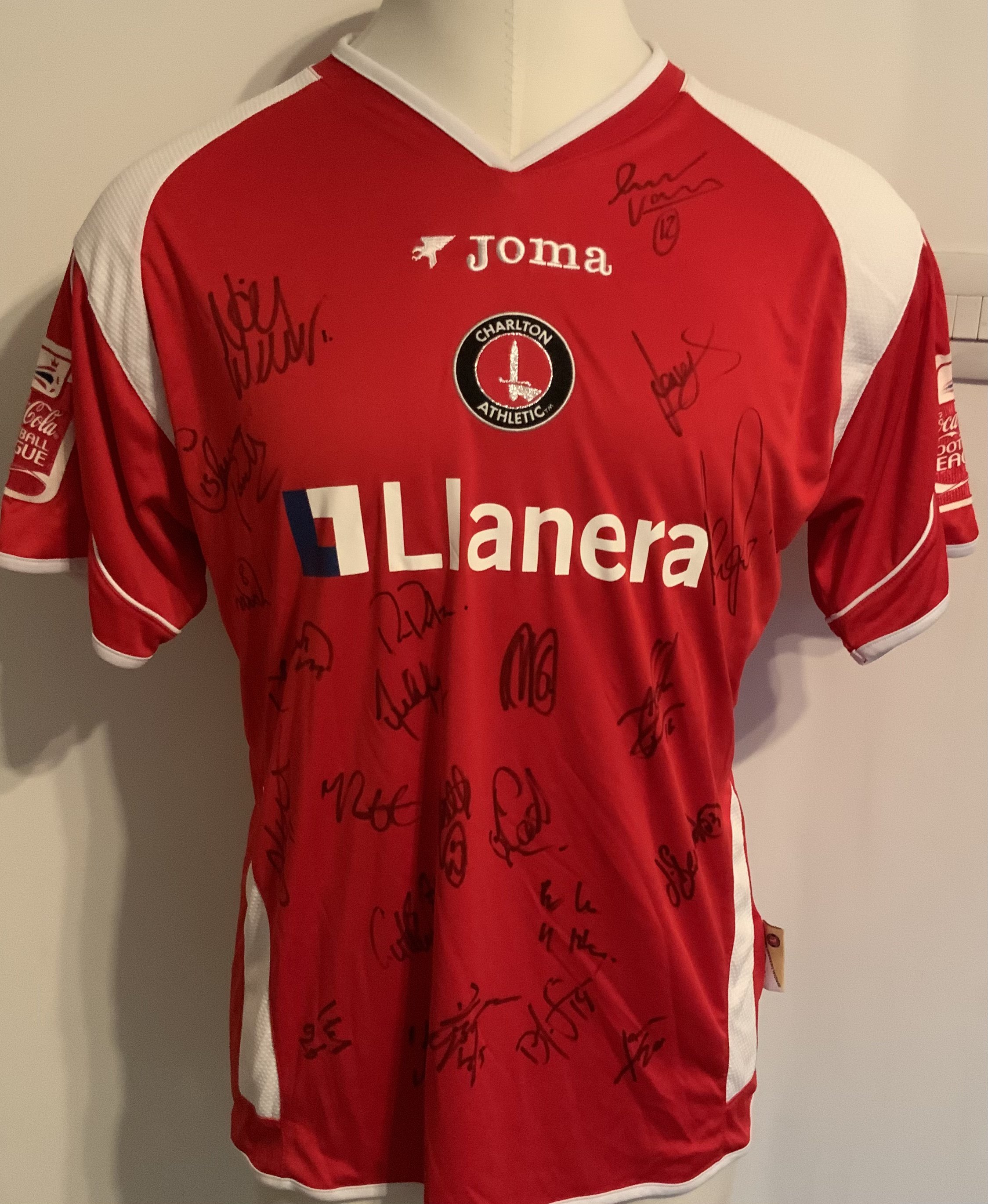 Charlton 2007 - 2008 Match Worn Football Shirt: Red short sleeve with Coca Cola badging to arms. Number 10 Sam to rear. Signed to front by the squad.
