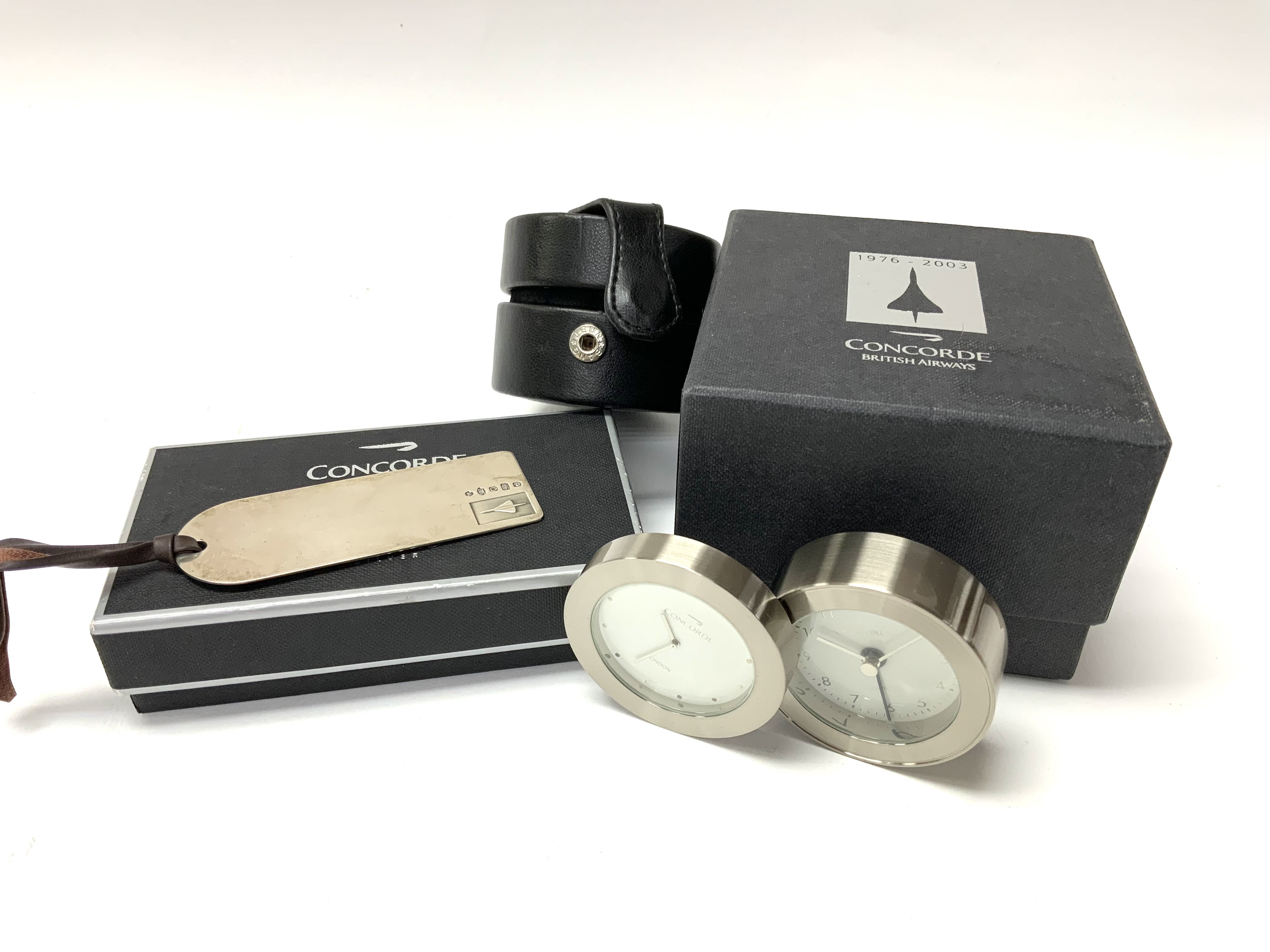 A boxed Concord hallmarked silver bookmark by CARRS together with a Concord cased travel clock. (B)