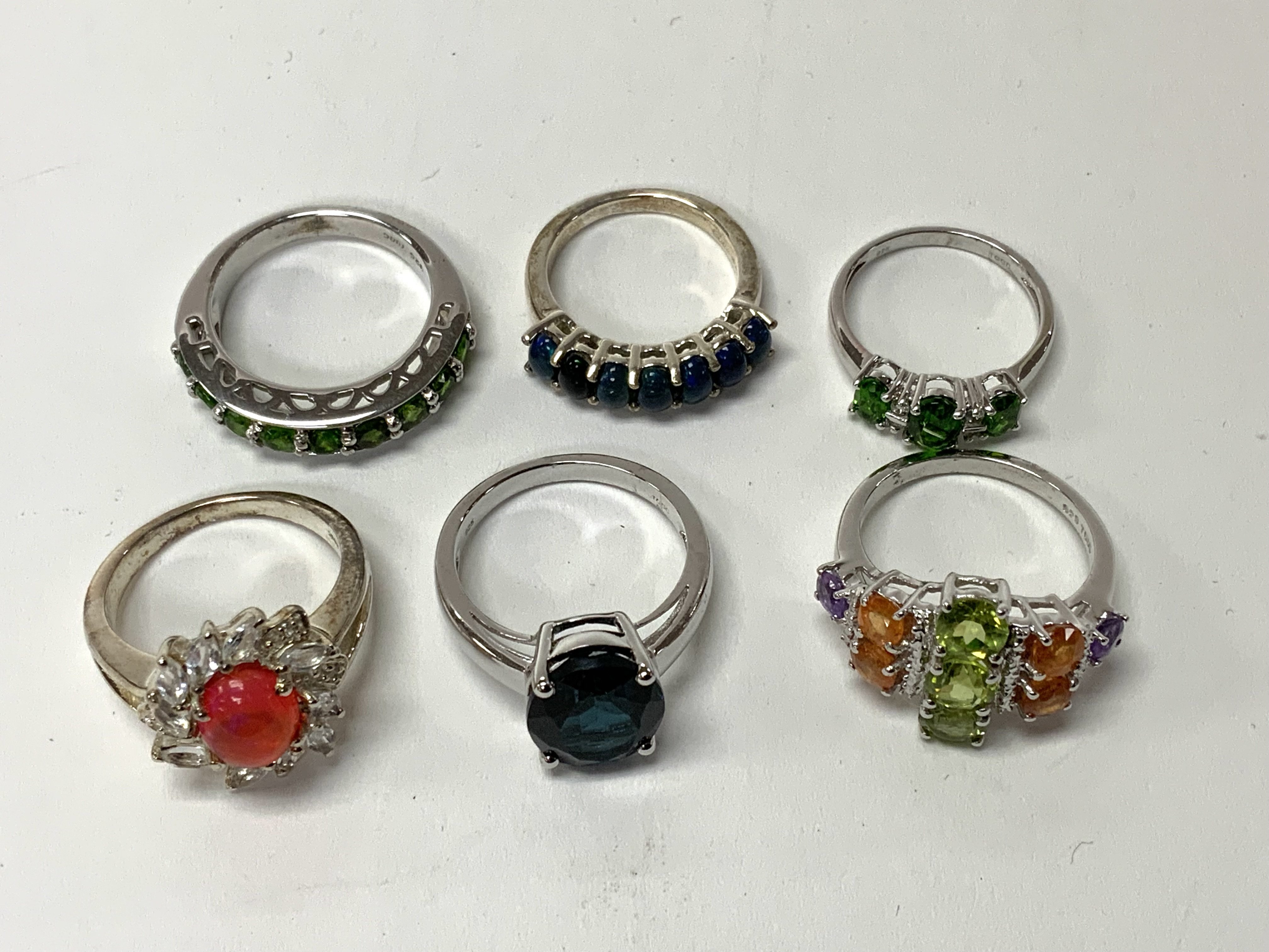 6 sterling silver and gem set rings. (Various sizes) (A)