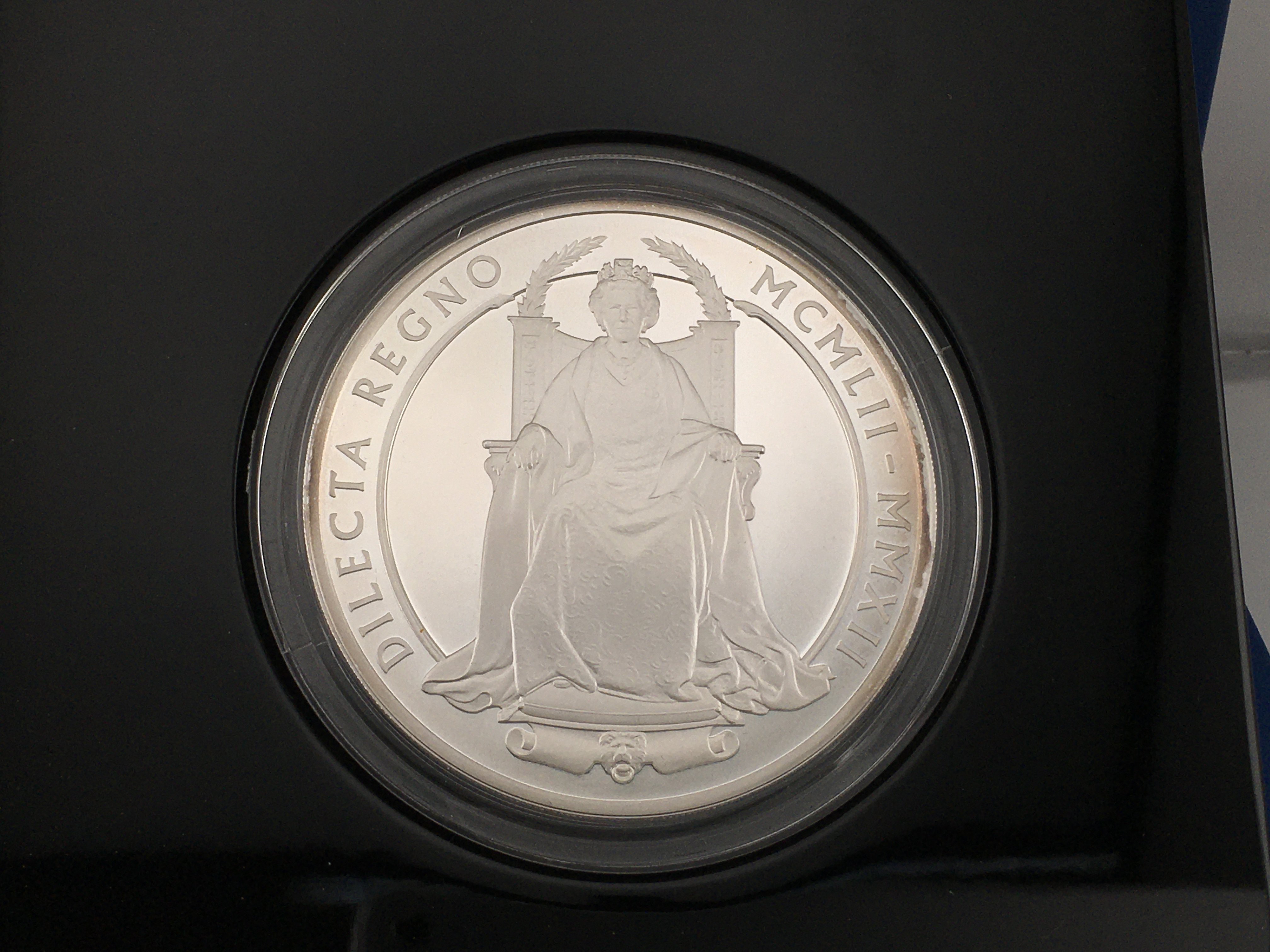 The diamond jubilee silver five ounce proof coin with COA. Postage B