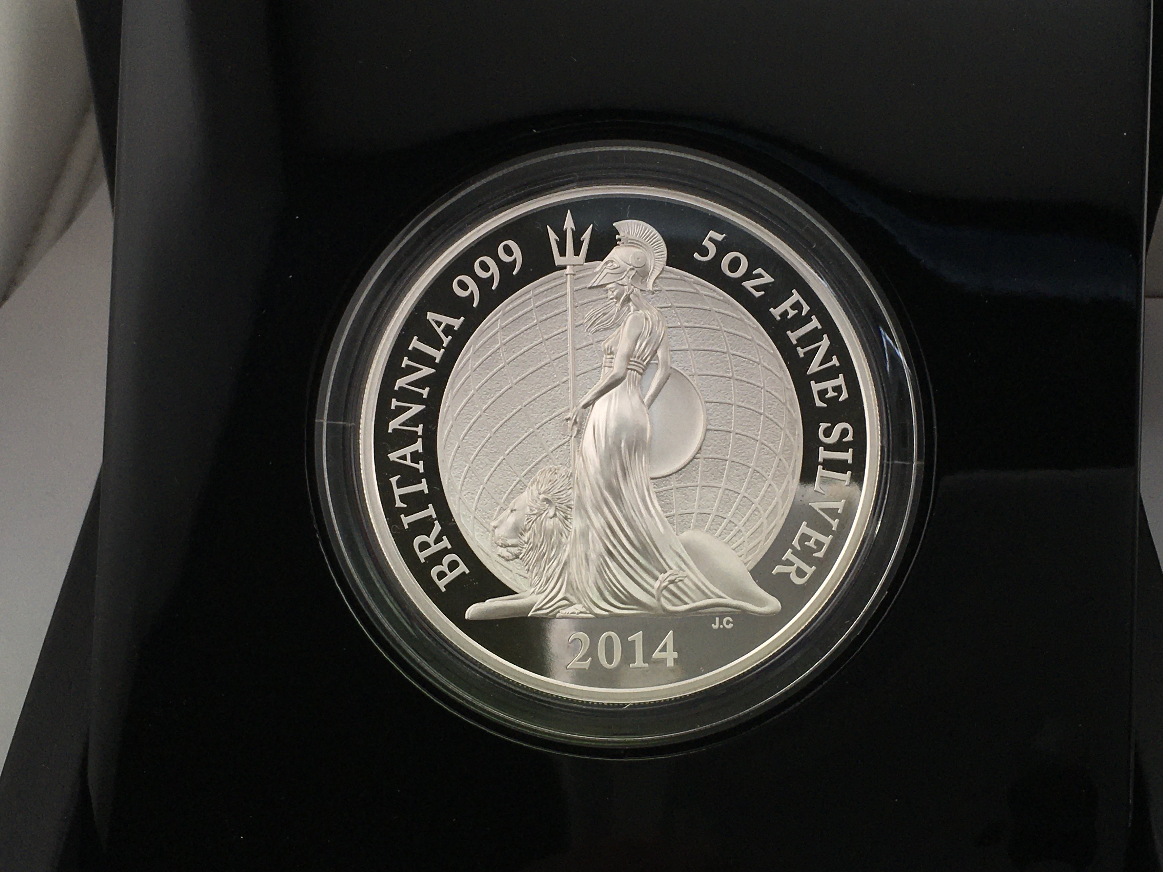 2014 five ounce silver proof Britannia coin with COA. Postage B