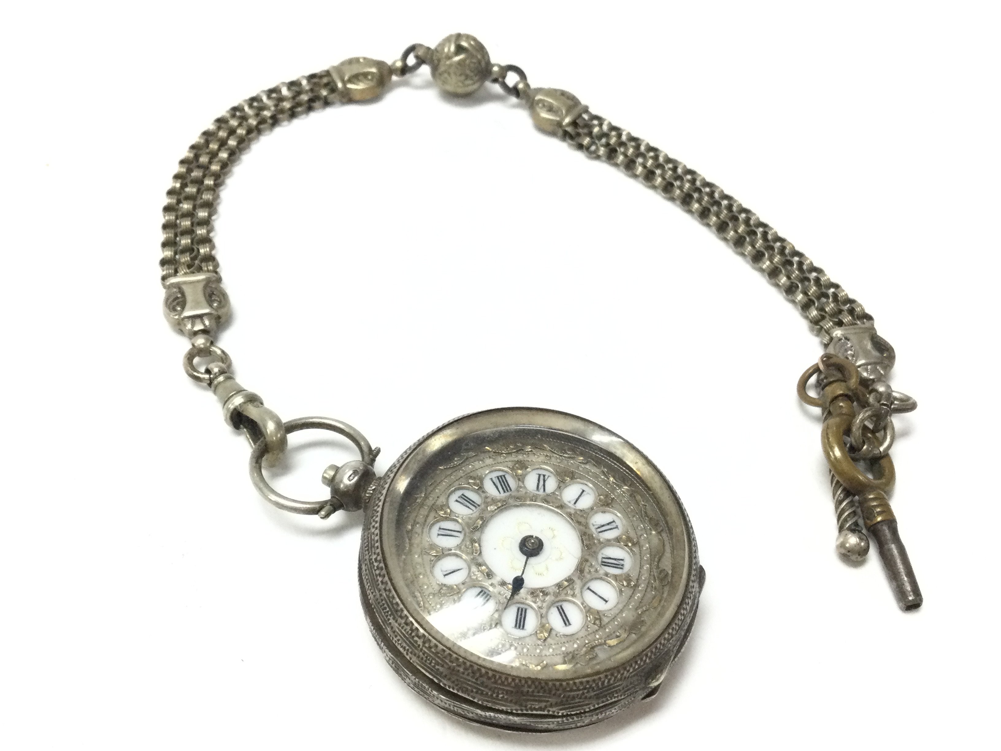A silver hallmarked cased pocket watch with attached silver albertina. Postage category a