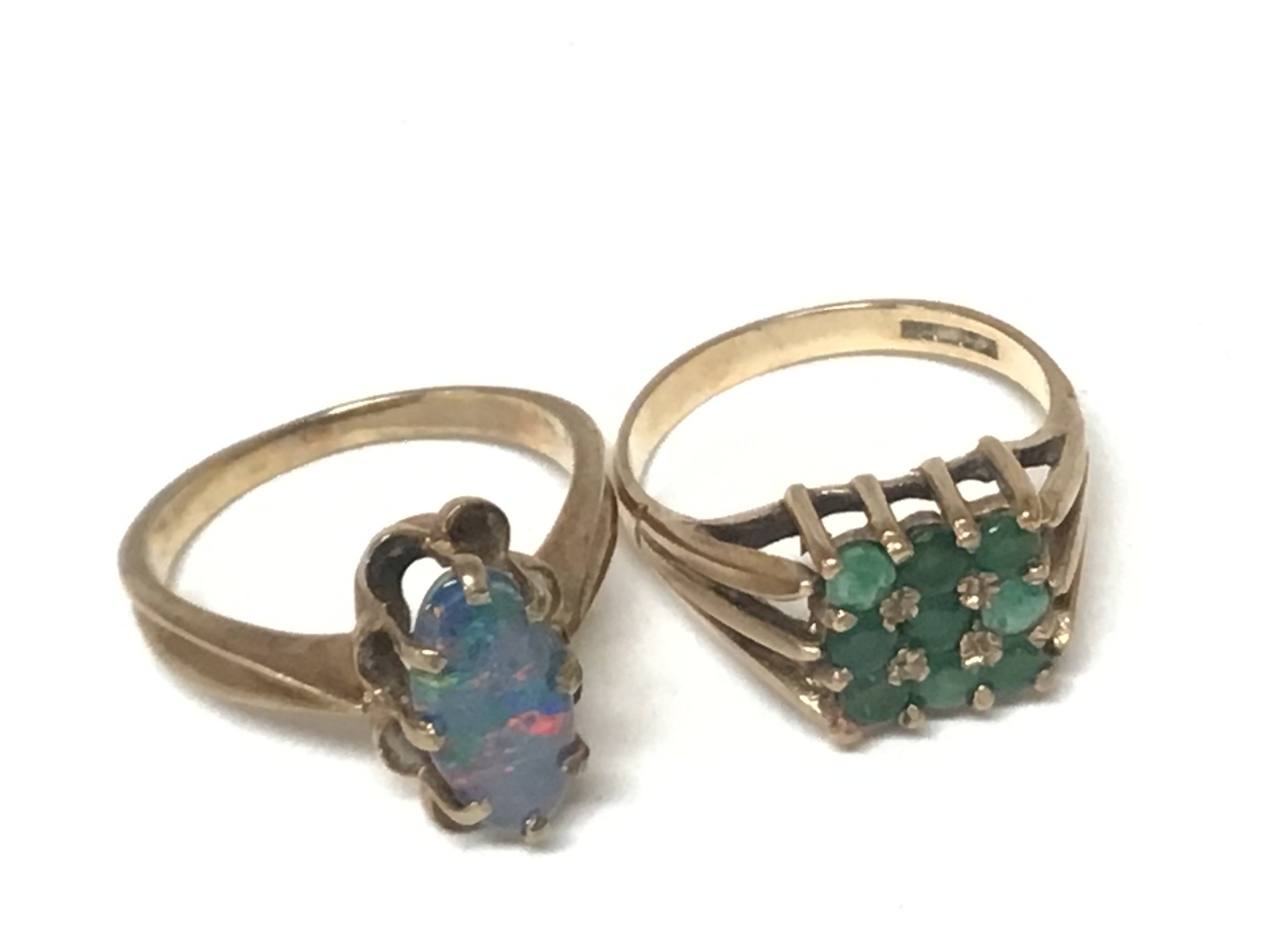Two 9carat gold rings set with green stones and an opal doublet weight 6.5g