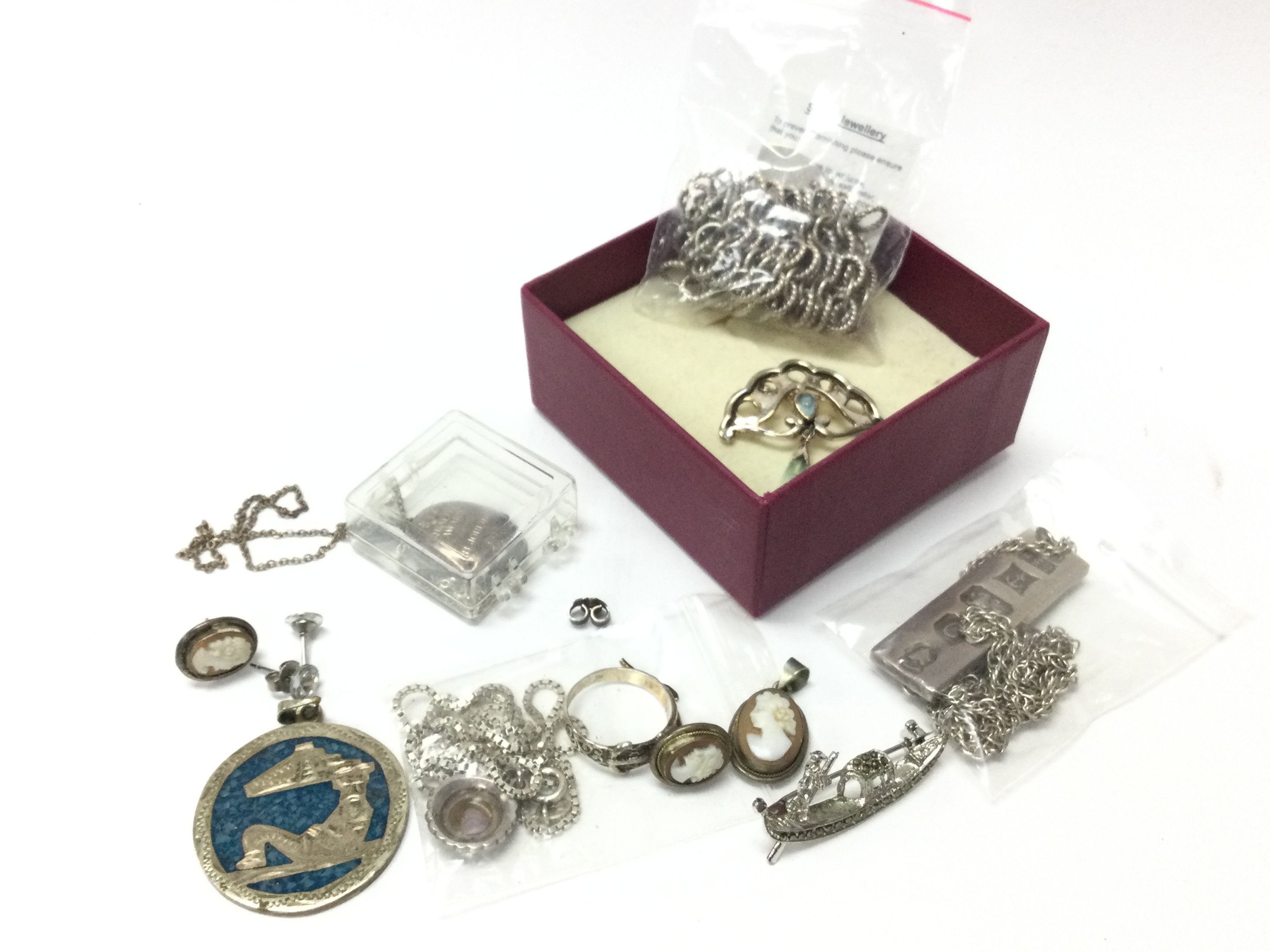 A small collection of silver jewellery including necklaces, bracelets. Postage category B