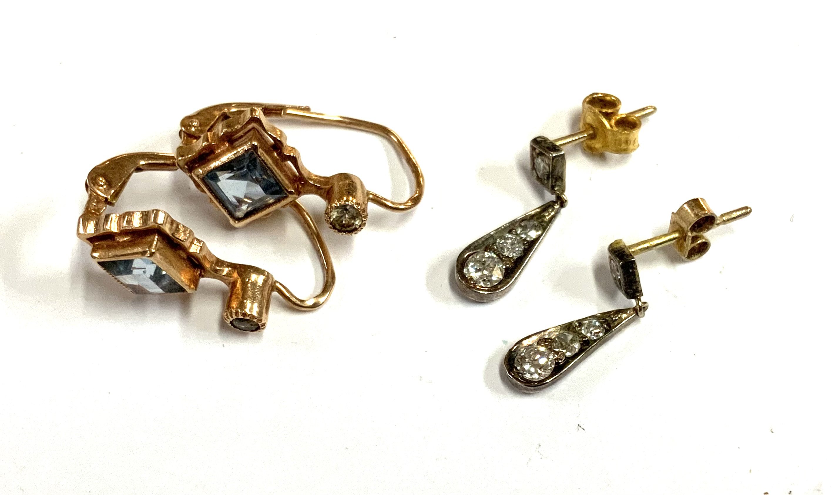 A Pair of 18ct Rose gold Aquamarine and Diamond earrings together with a 1930s pair of 18ct and graduated old cut diamond stud drop earrings (A)