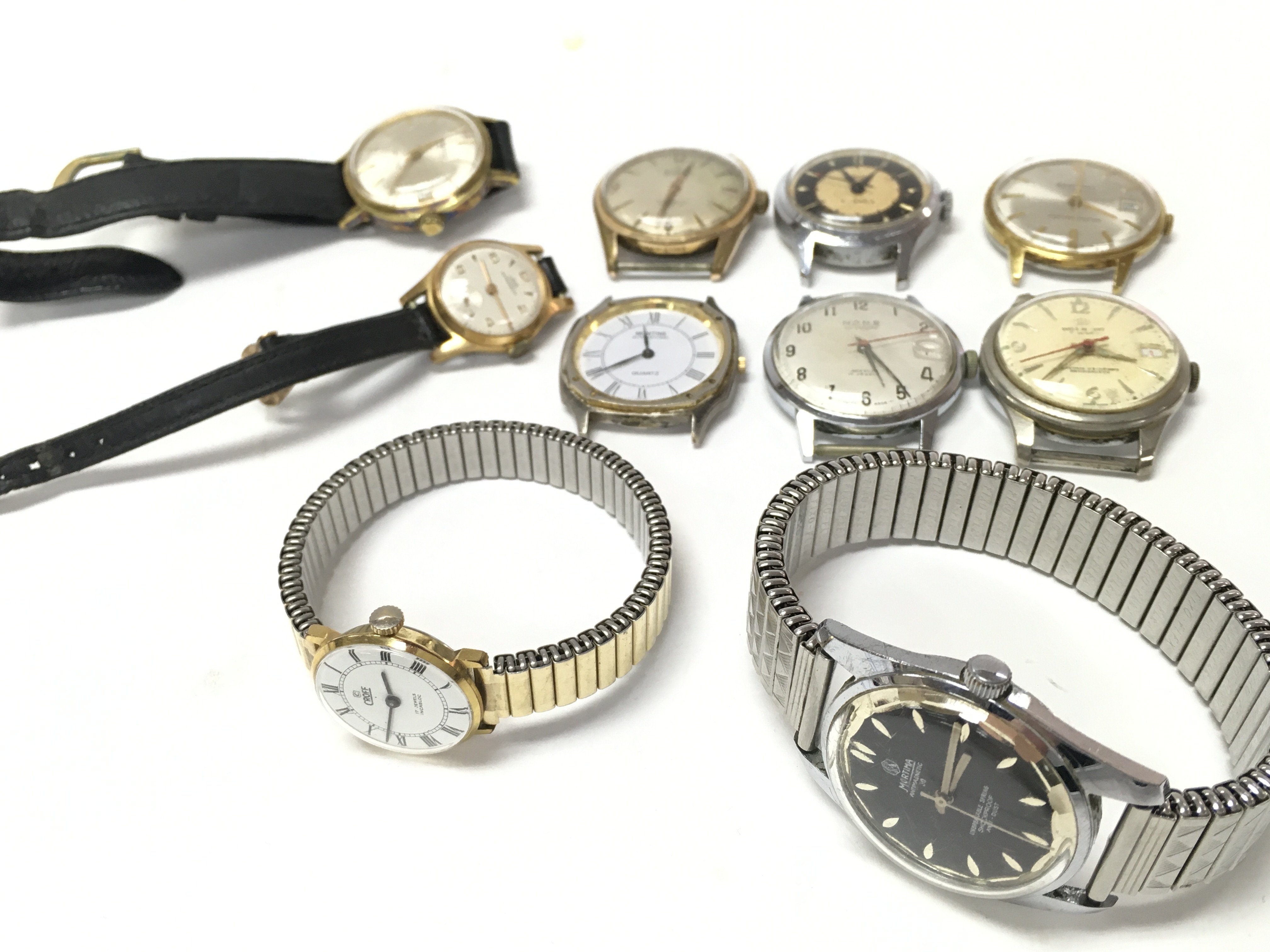 A Collection of vintage watches including Mortima, Rone, Allaine, Swiss De Luxe, Ingersol etc. some seen working postage cat B