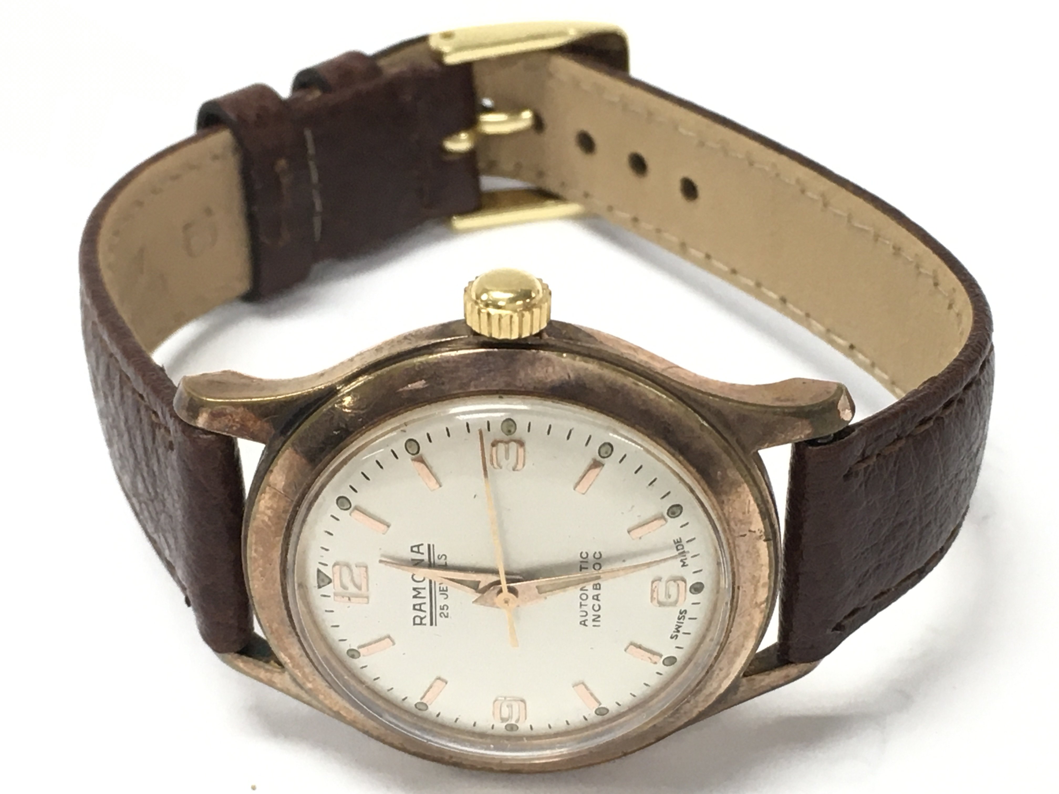A mens vintage Swiss Romana 25 jewel automatic watch, 34mm case. Seen working. Postage catA