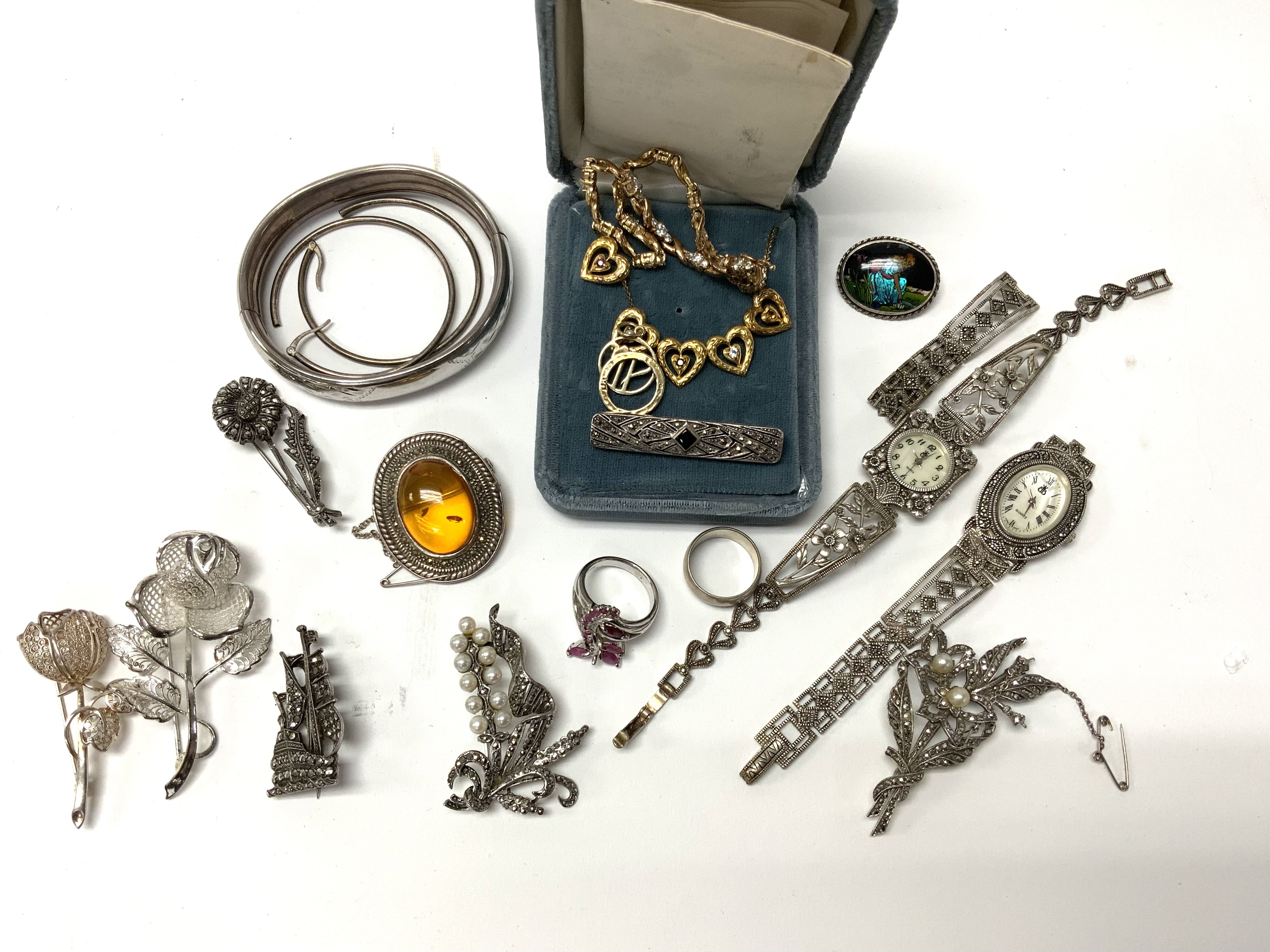A small collection of silver jewellery and gilt metal jewellery. (D)
