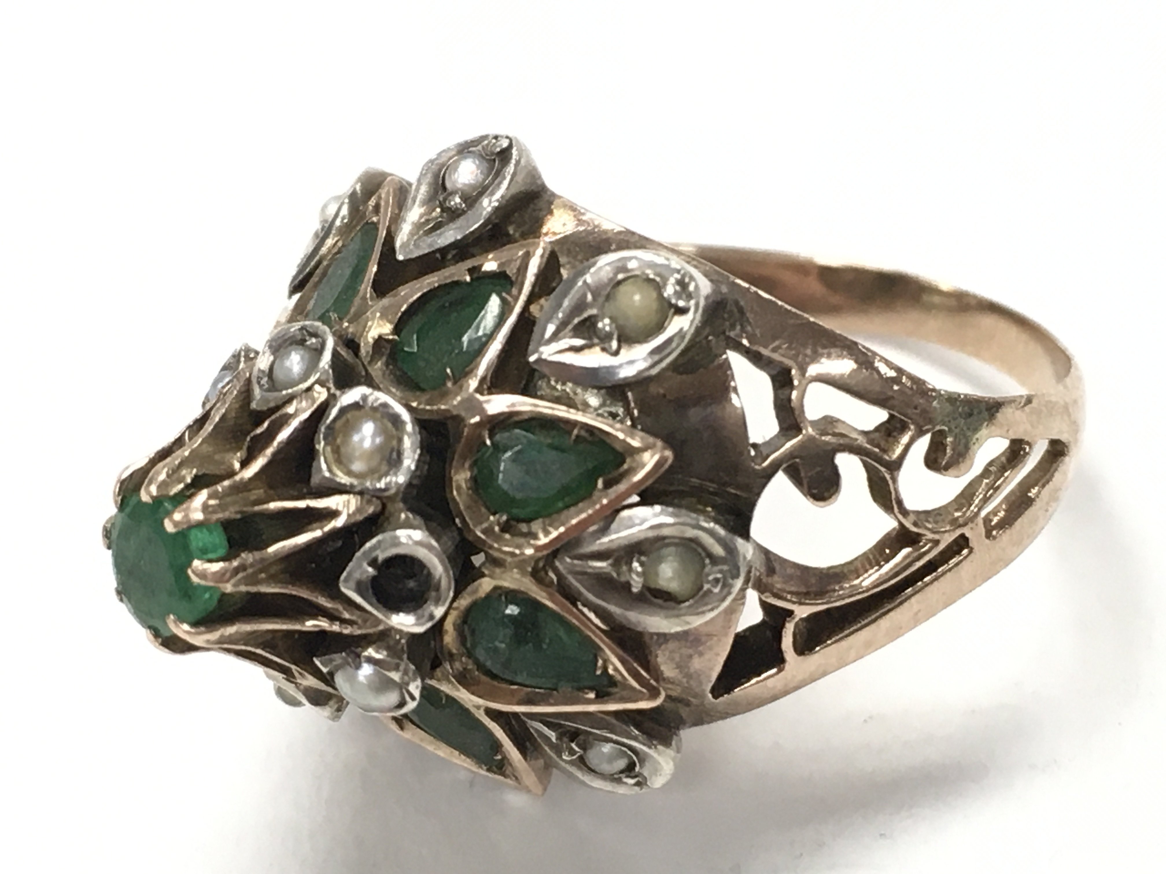 A 9ct gold emerald and pearl set dress ring , size J/K. Total weight 5.8g Postage category A