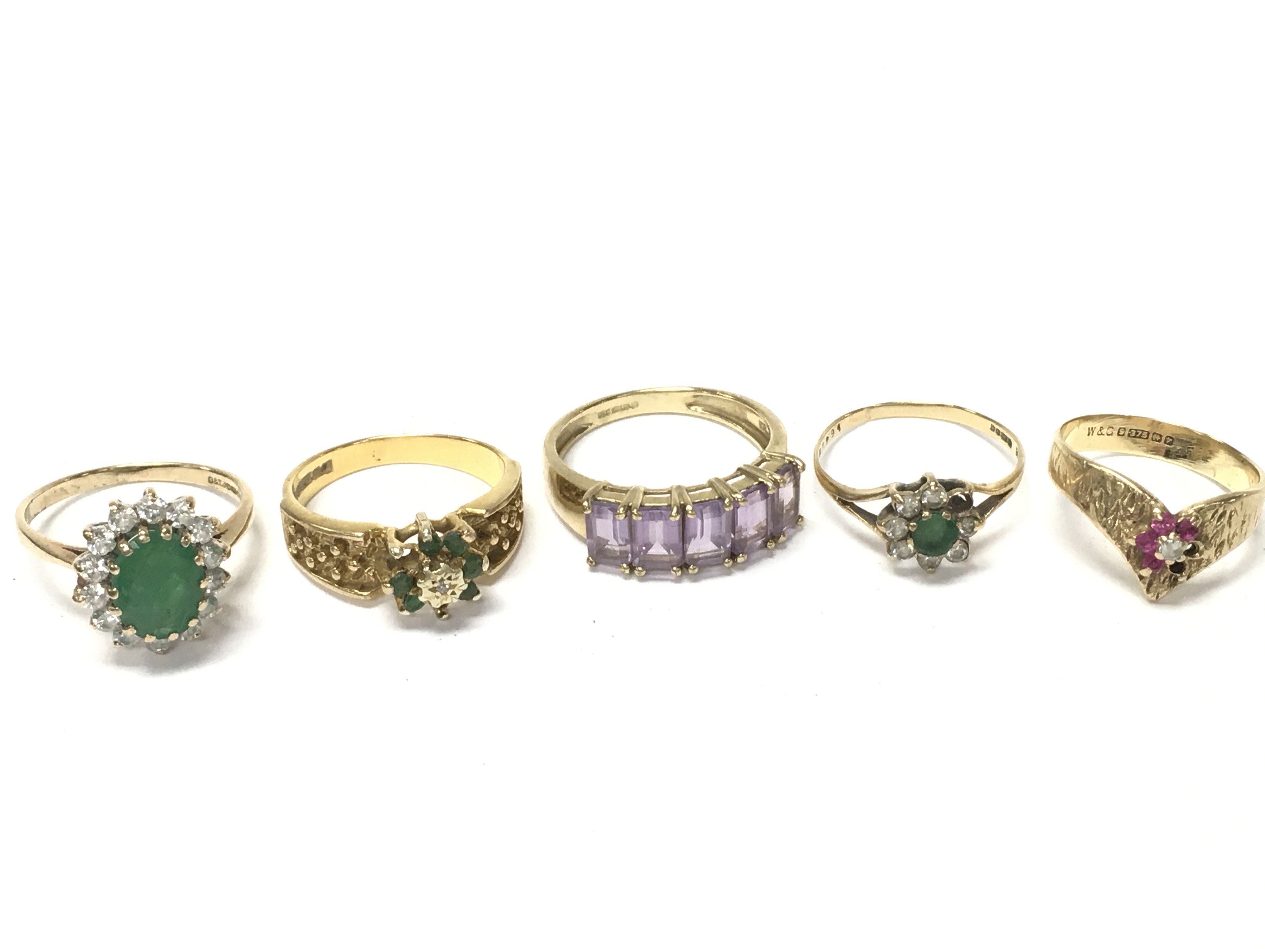 A collection of 9 carat gold stone set dress rings, total weight 12.8g postage cat A