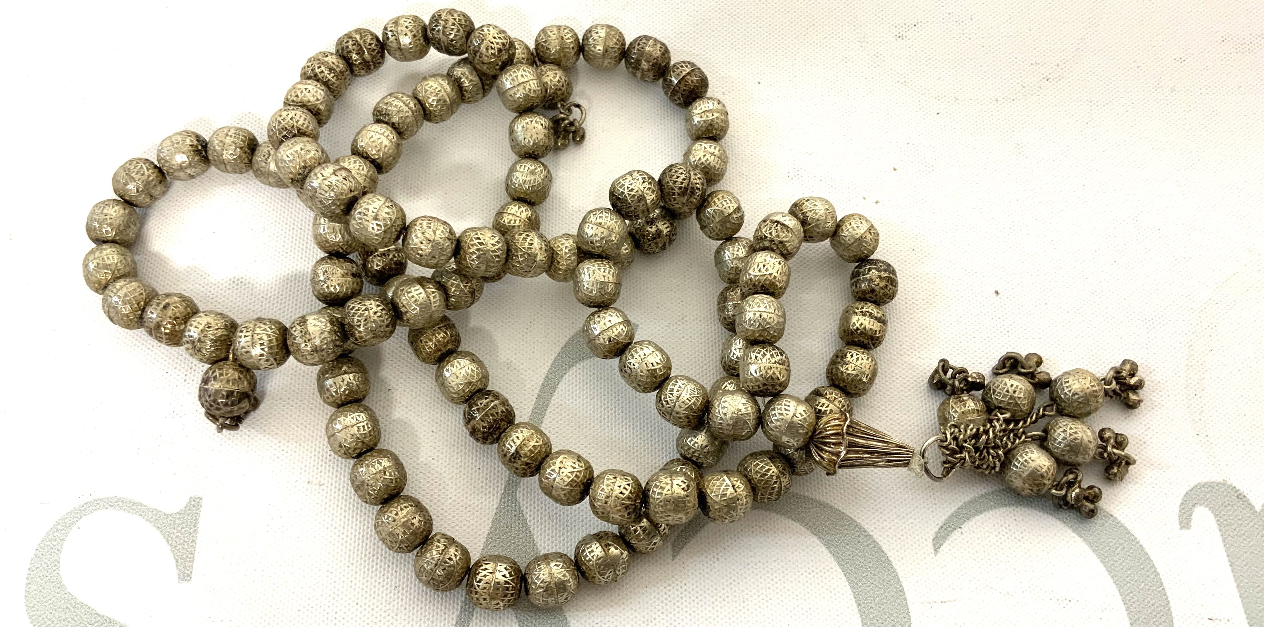 An Eastern white metal necklace. (A)