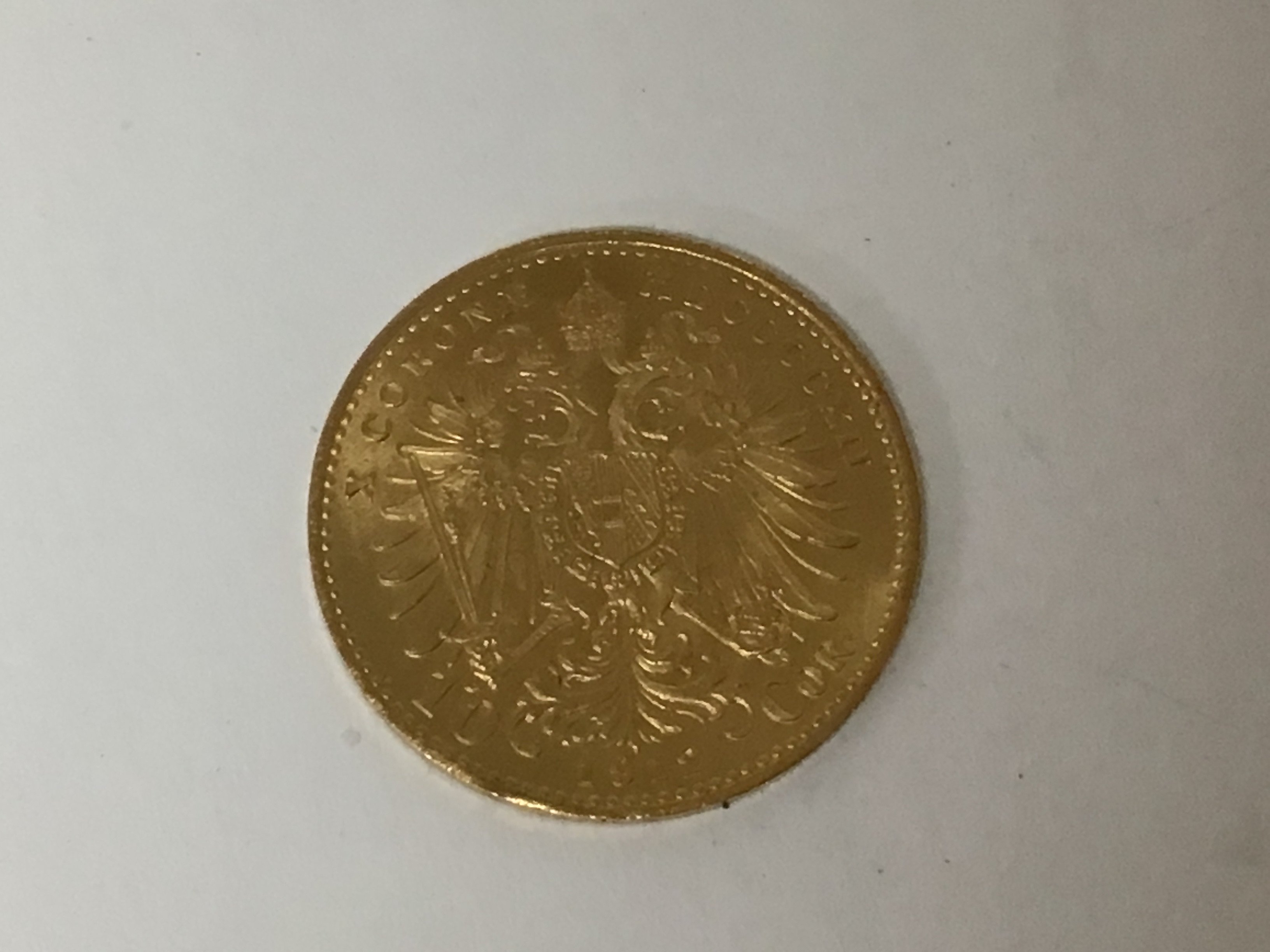 An Austrian gold coin 1912 10 Corona. Weight 3.4g