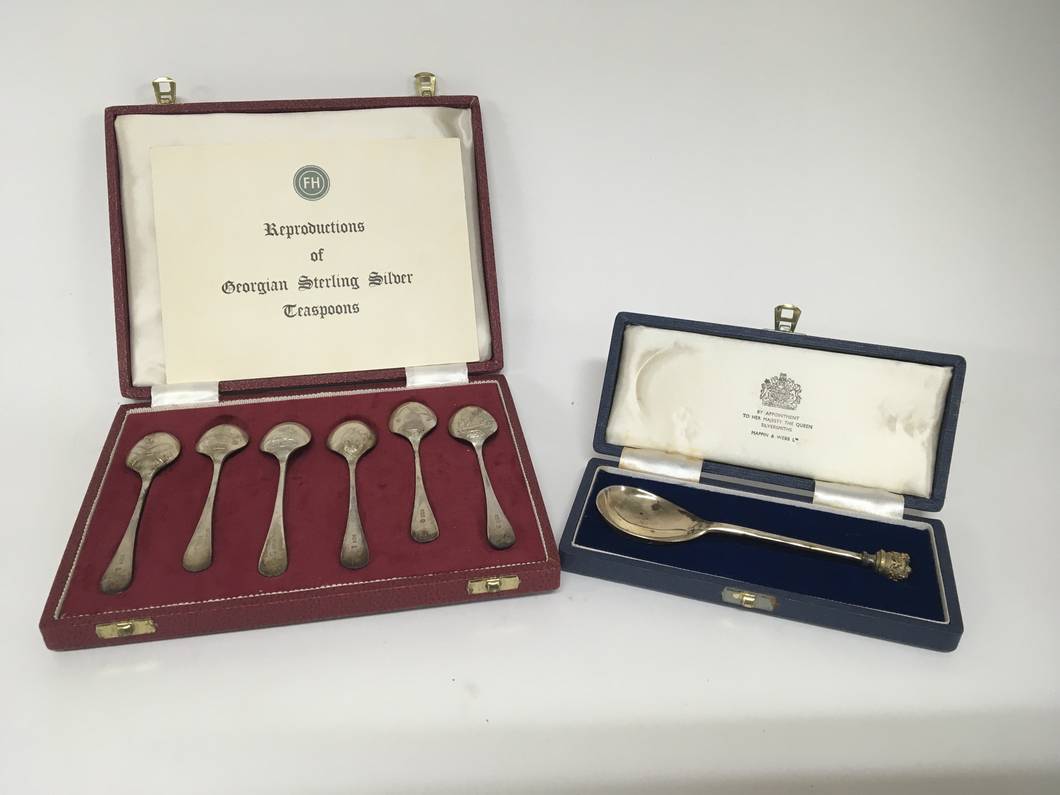 A cased set of silver spoons and a seal top crown silver spoon (2)