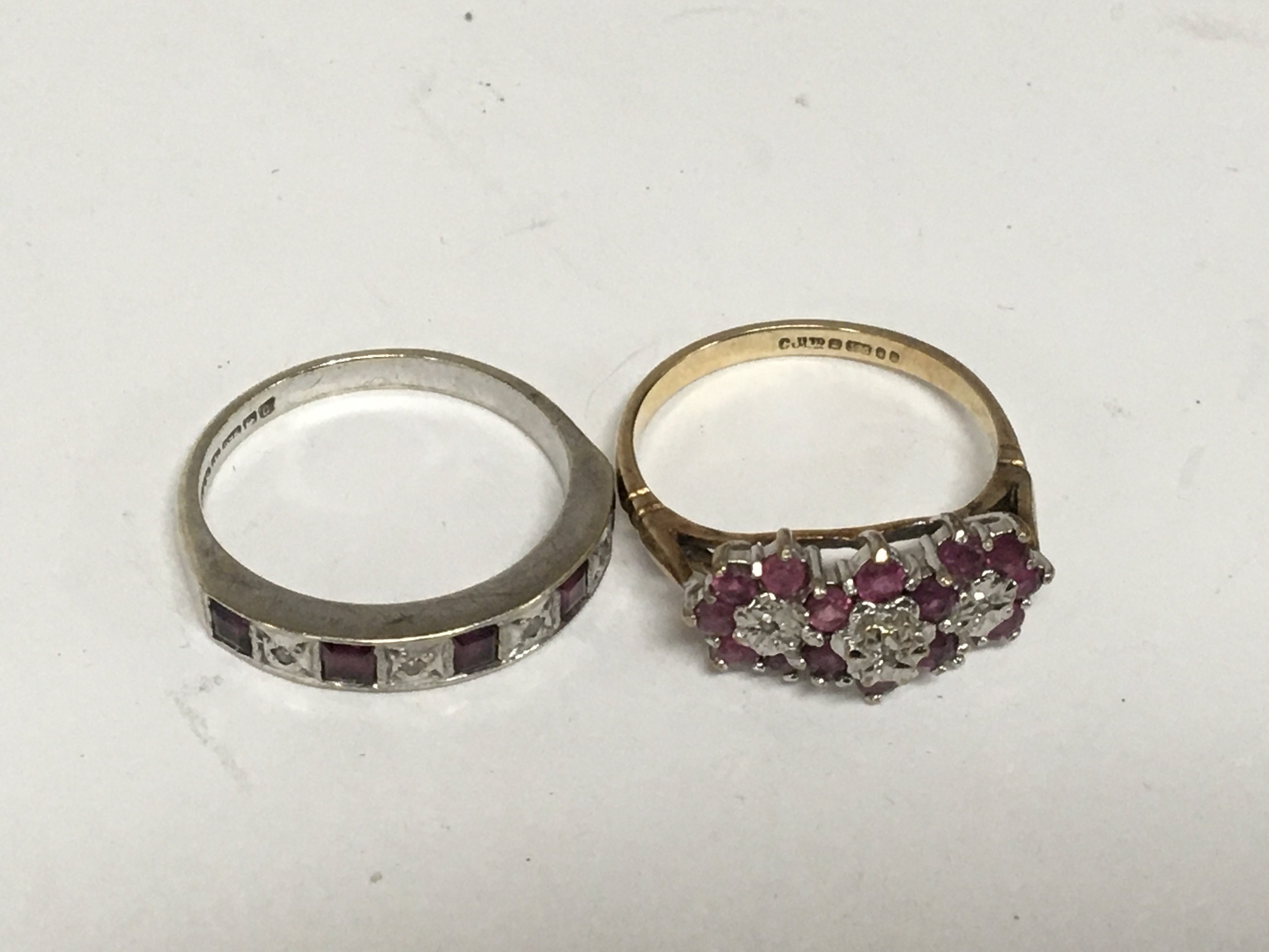 Two 9carat gold rings set with ruby and small diamonds. Weight 6g