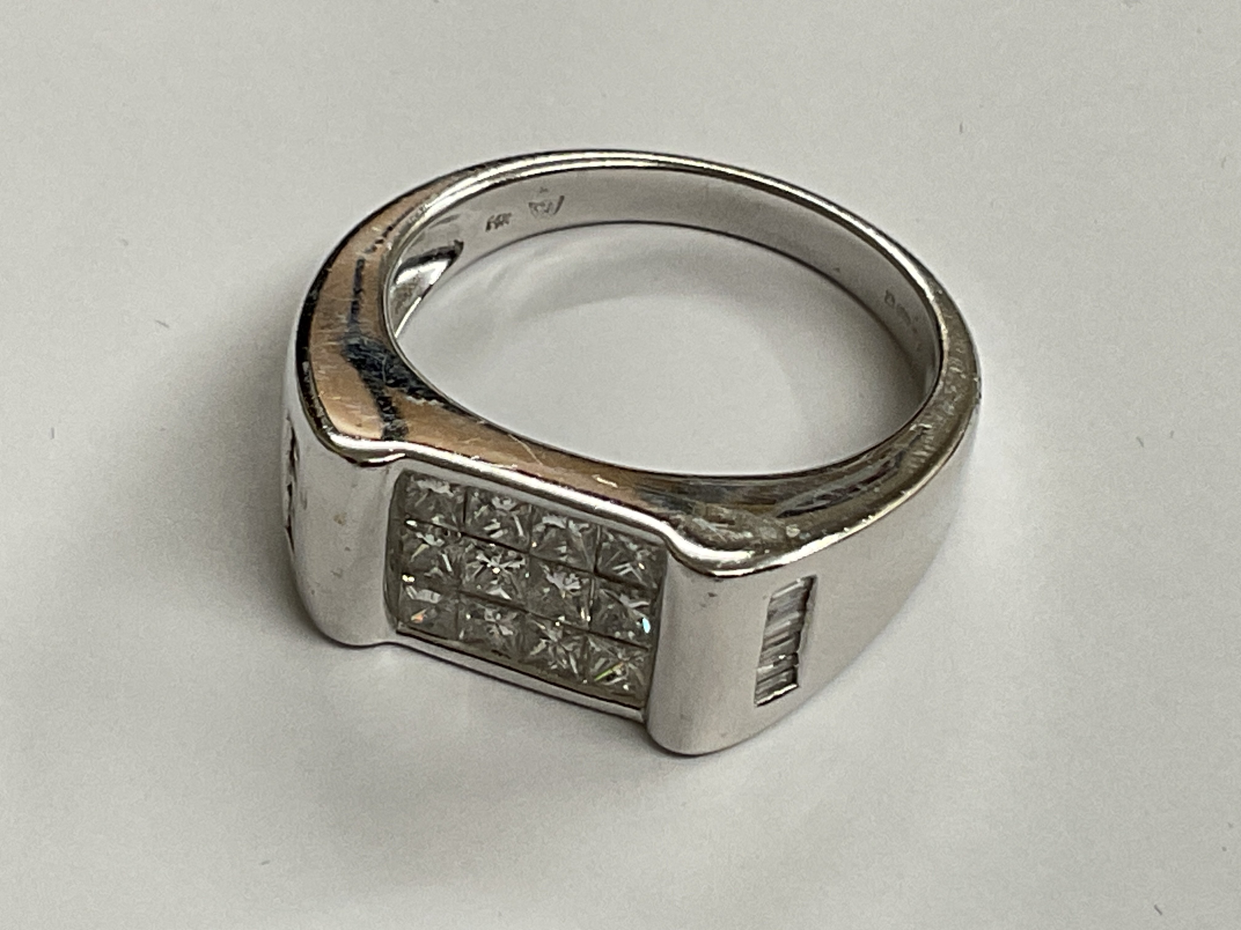 White gold diamond ring, Princess cut. 1.24ct, 7.96g, ring size approx O. Postage category A.