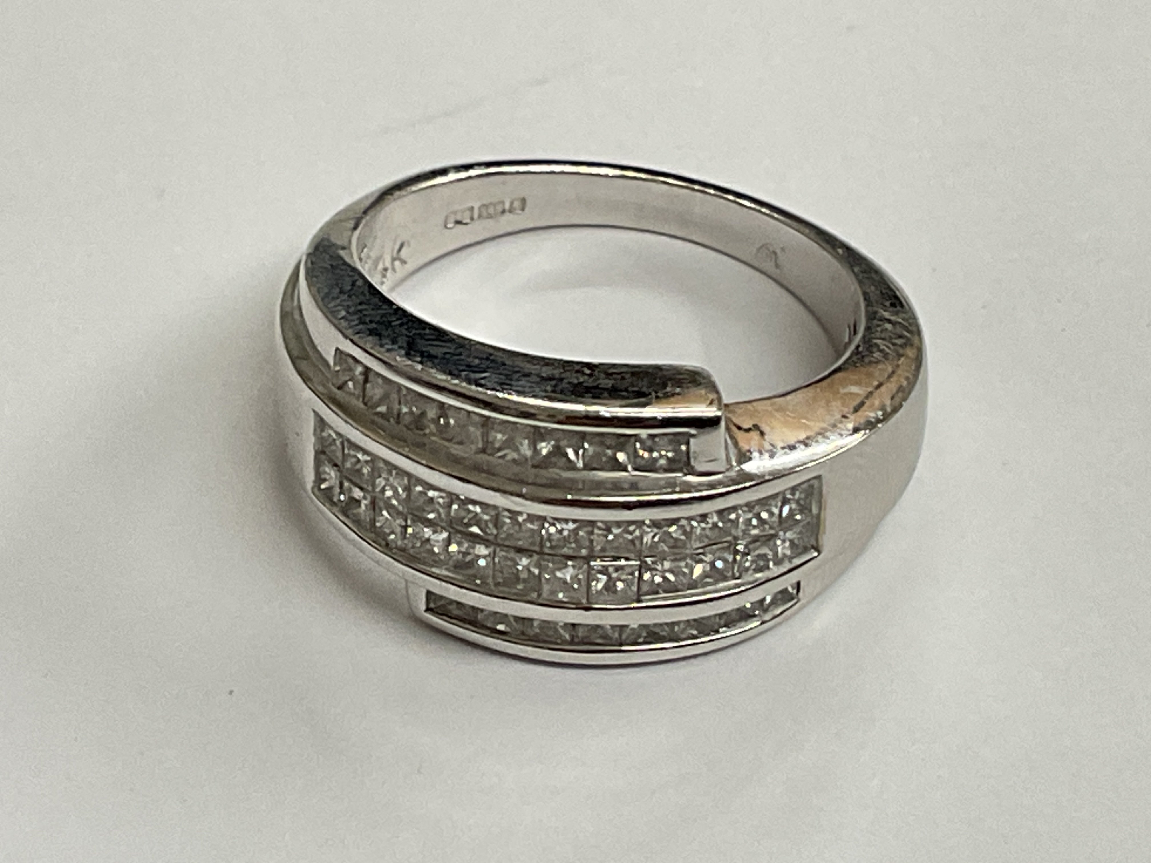 White gold diamond Princess cut diamond ring. Approx ring size U. 8.04g, 1.25ct. Postage category A.