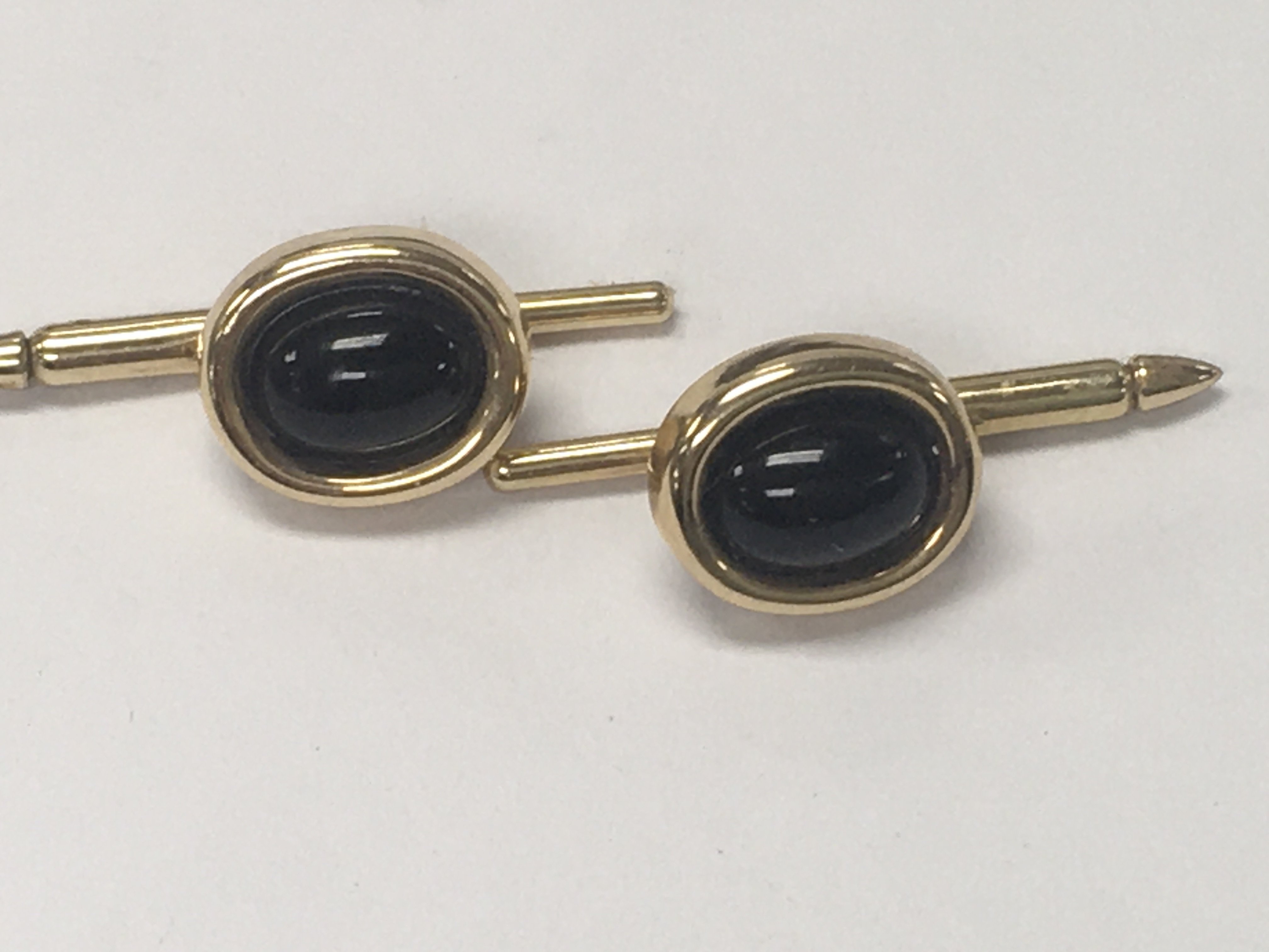 A pair of 14 k gold cufflinks.total weight 3.3 grams.