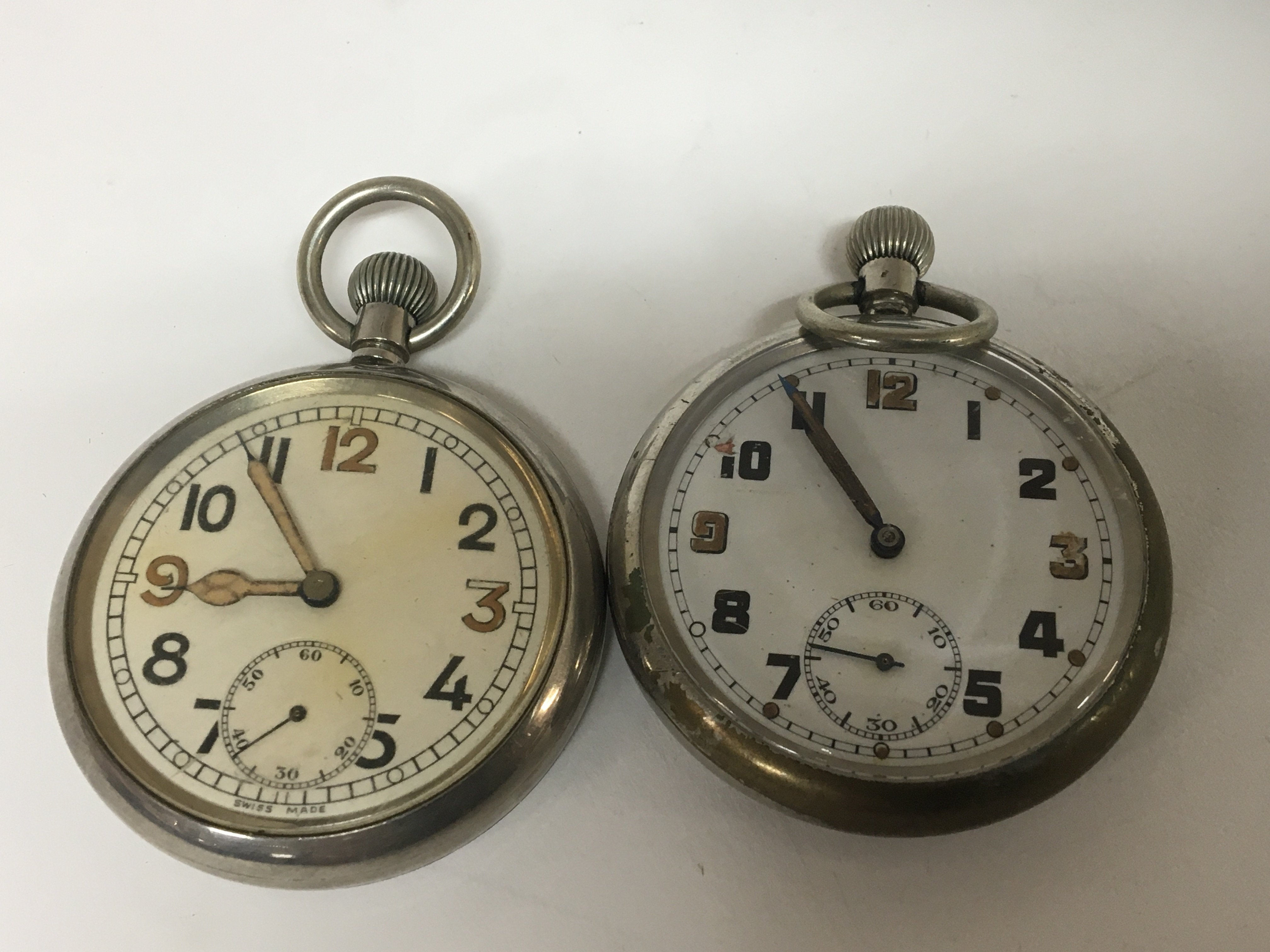 Two Military button wind pocket watches both seen working. (2)