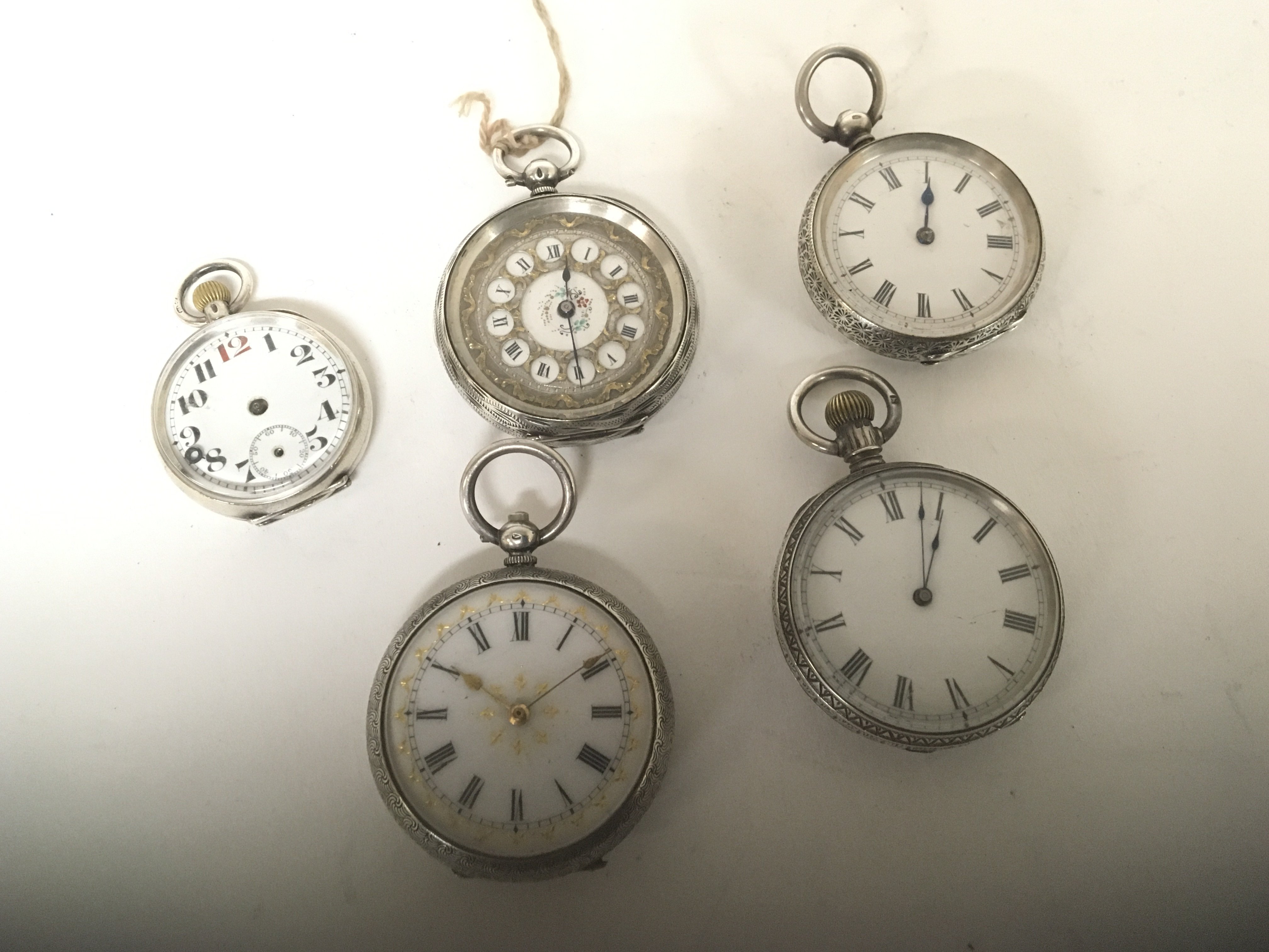 A collection of silver cased small sized pocket watches and fob watches key wind (5)