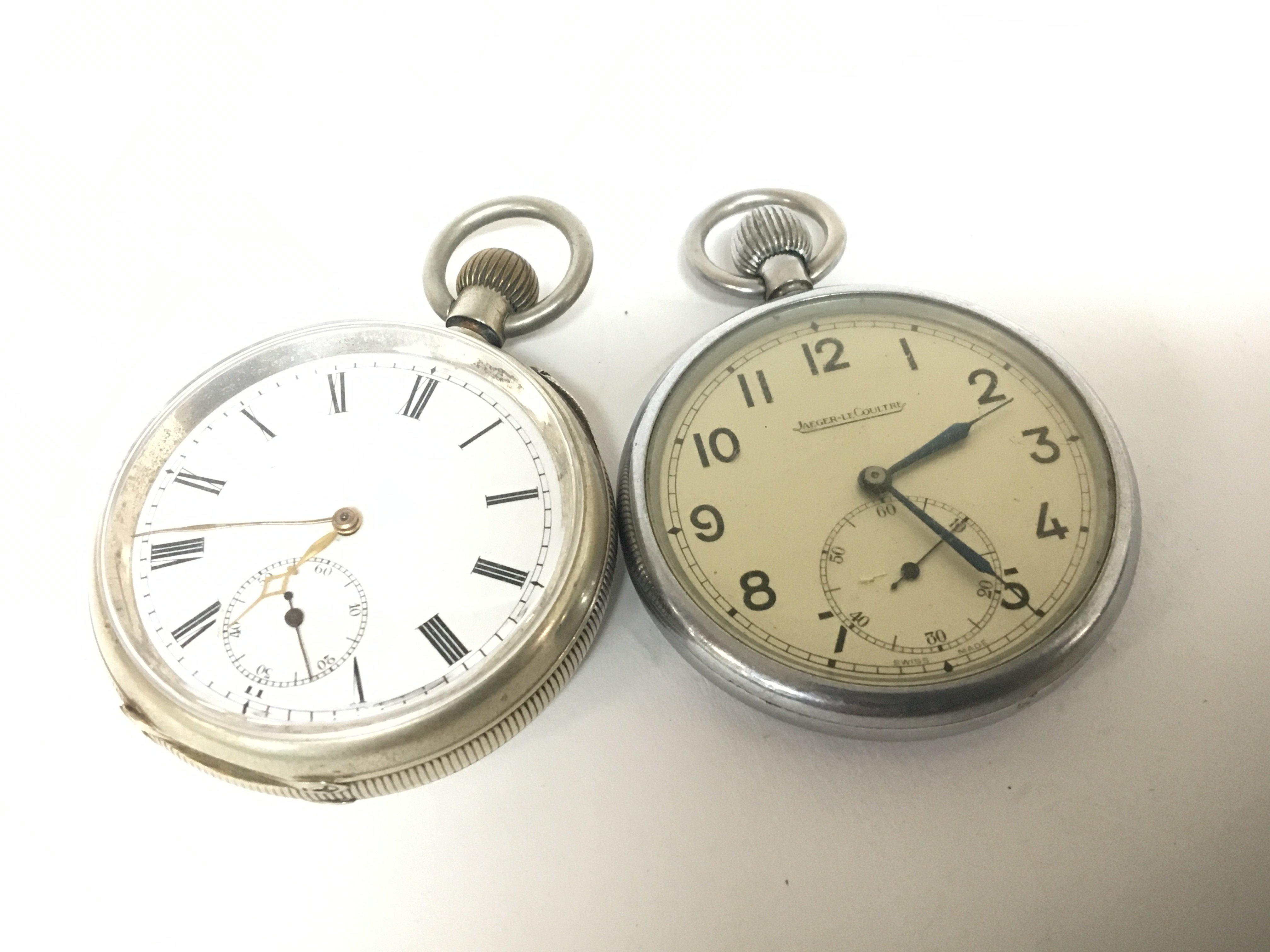 A Jaeger Le Coultre Milatry button wind pocket watch not seen working and one other pocket watch (2)