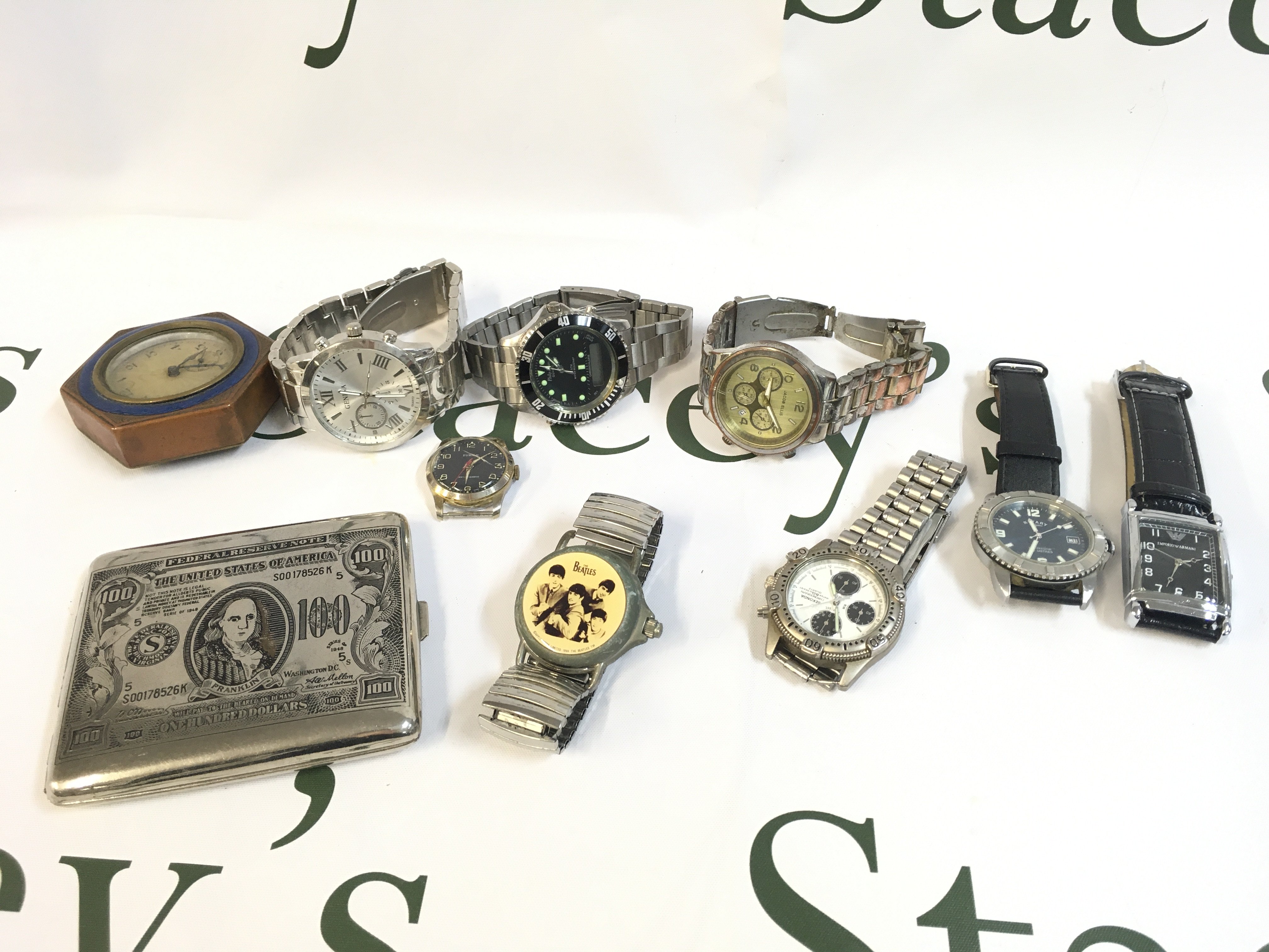 A Collection of various watches including a vintage Beatles watch, Sekonda, Rotary. Postage category B