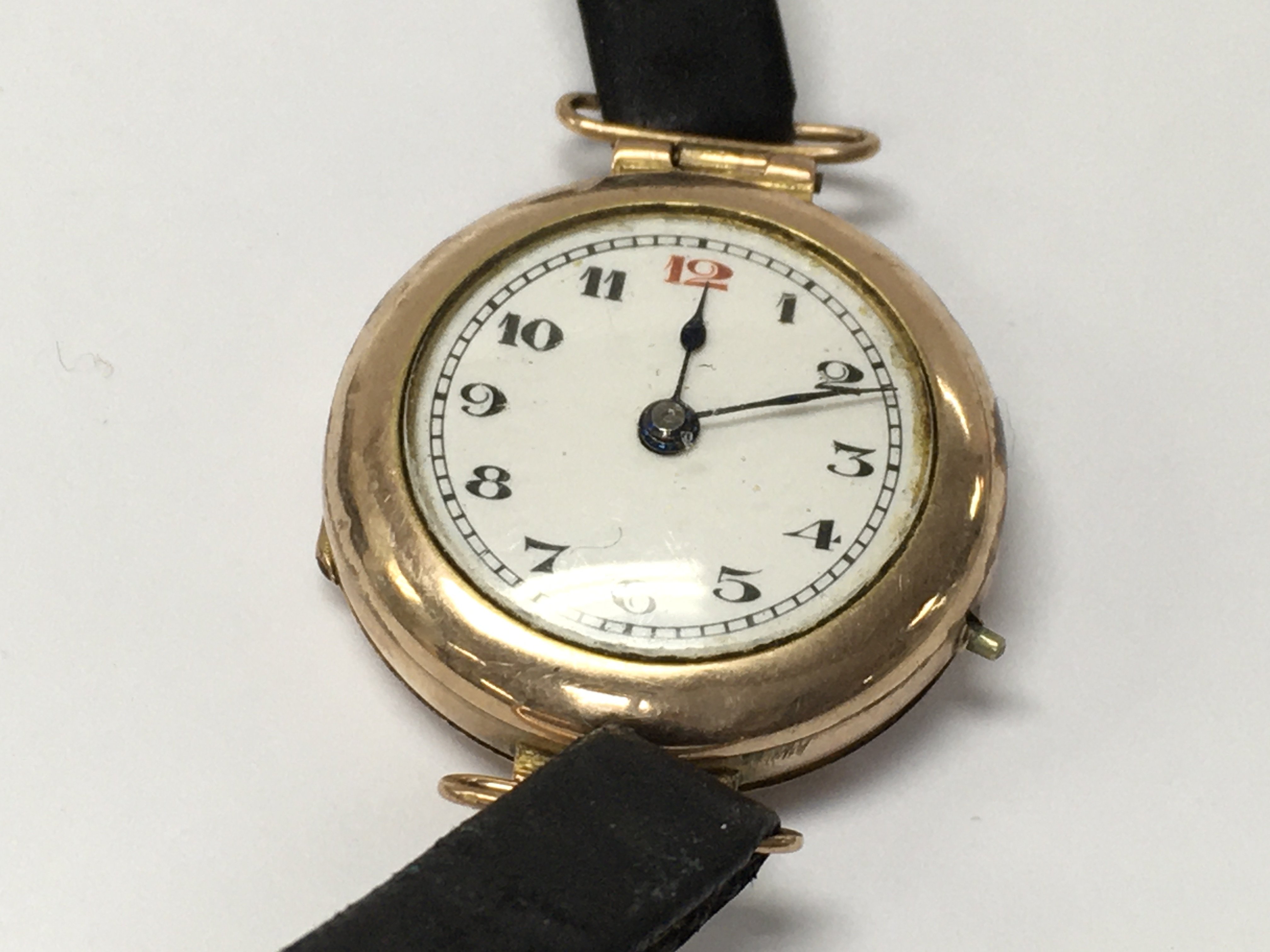 A 9ct gold watch in need of restoration. 16.90g. Postage A