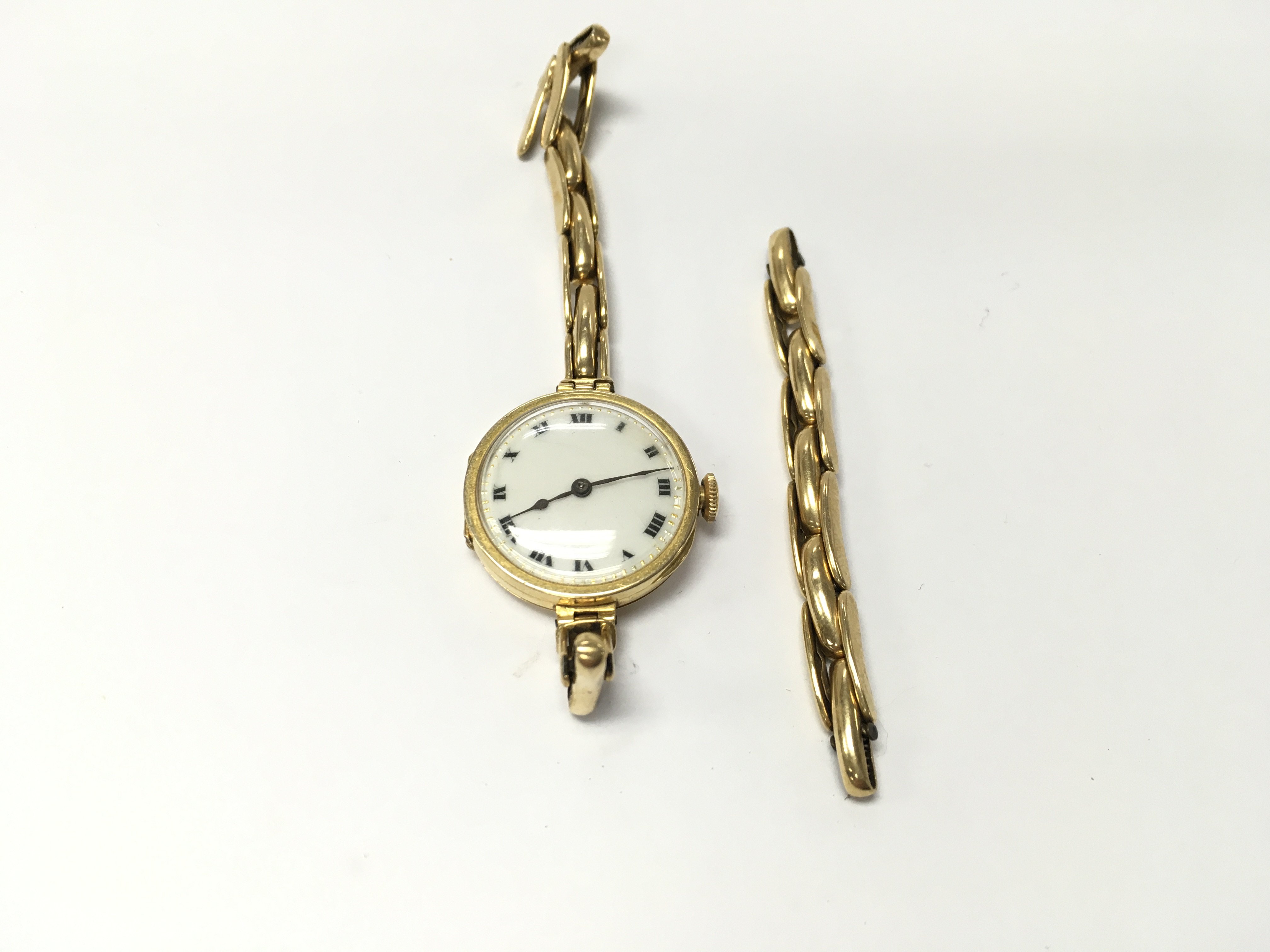 An 18ct gold ladies watch with expandable strap for restoration. Postage A