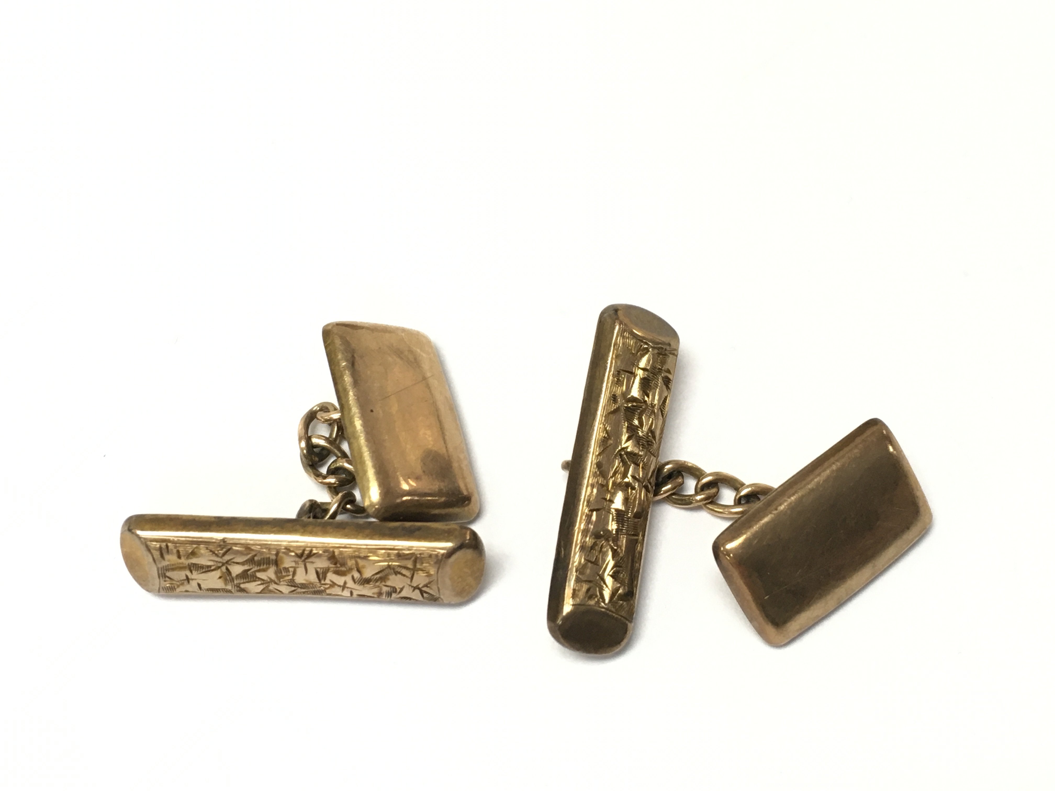 A pair of 9ct gold cufflinks. Postage B
