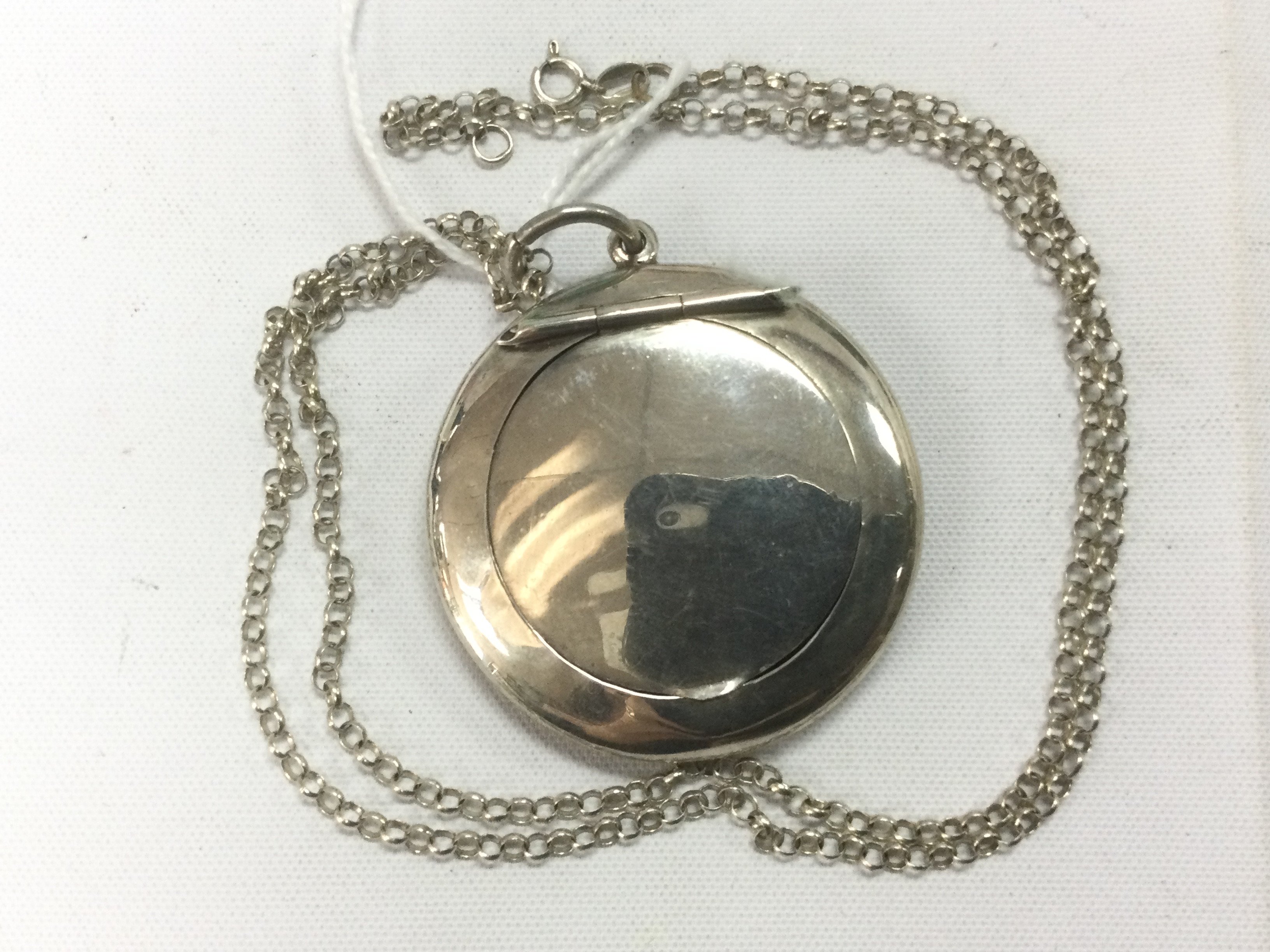 A silver locket / compact, Birmingham hallmarks. Shipping category A.