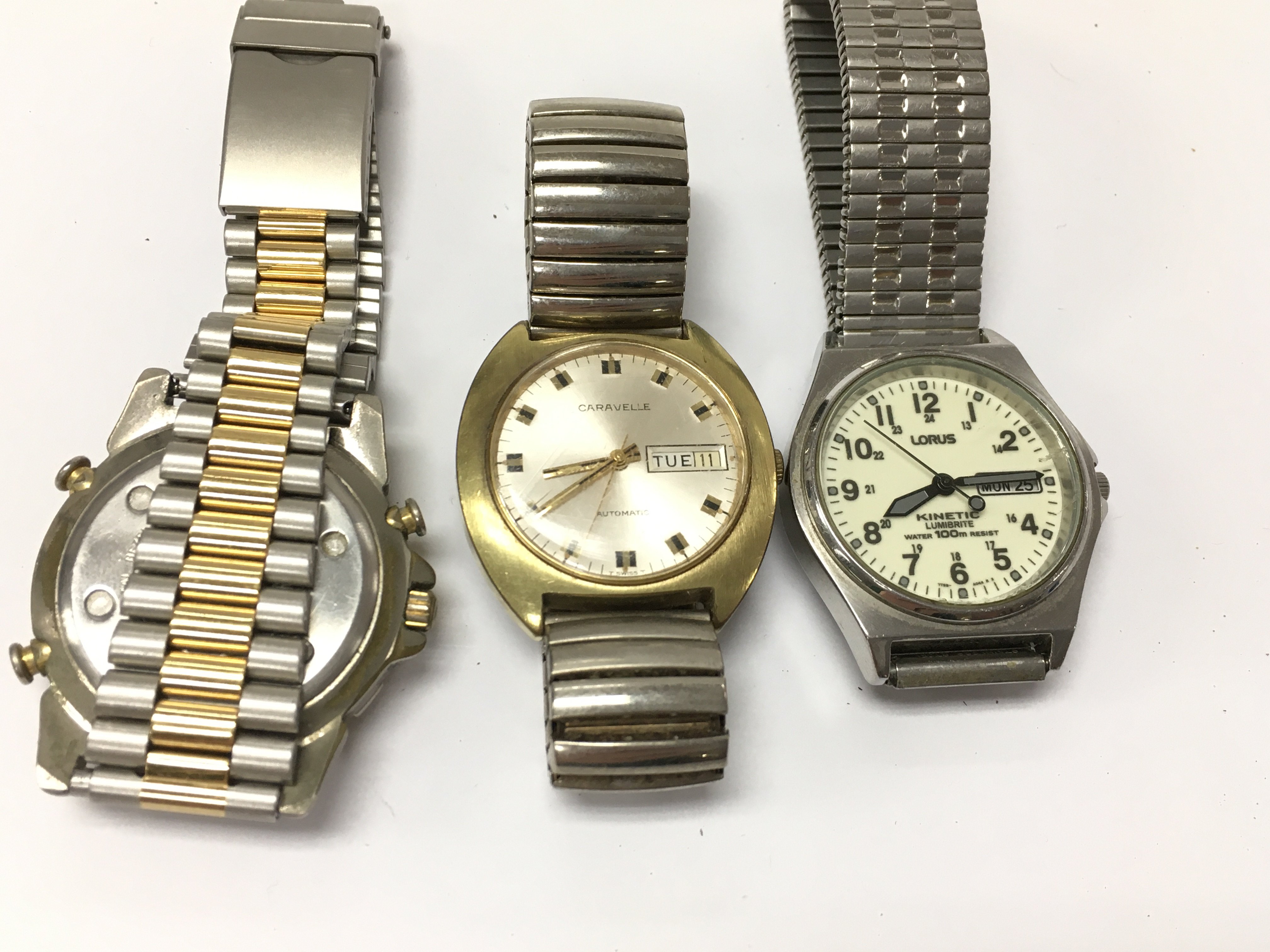 Two vintage automatic watches and one other. Postage B
