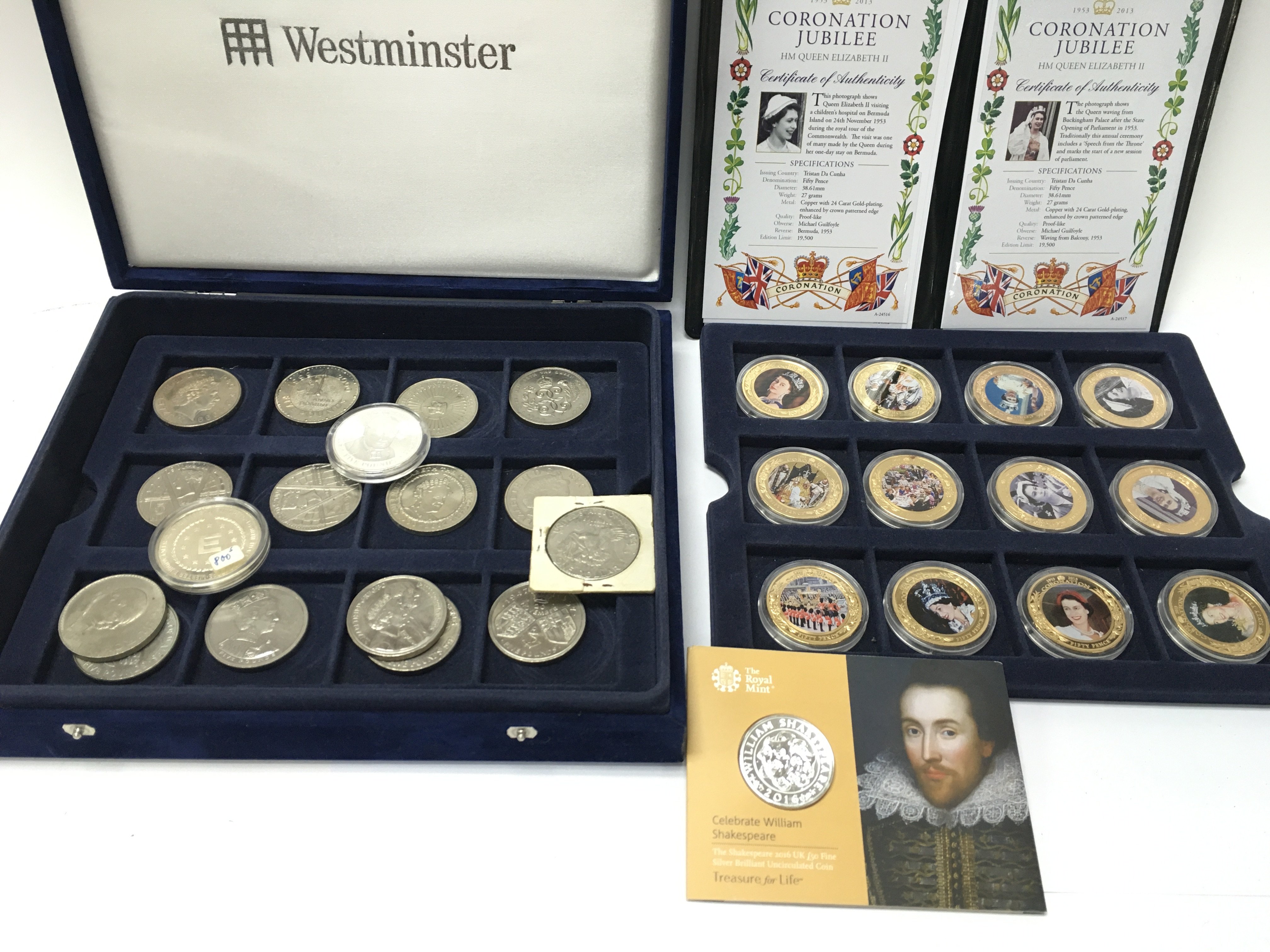 A silver &pound;50 brilliant uncirculated coin and other commemorative coins. Postage B