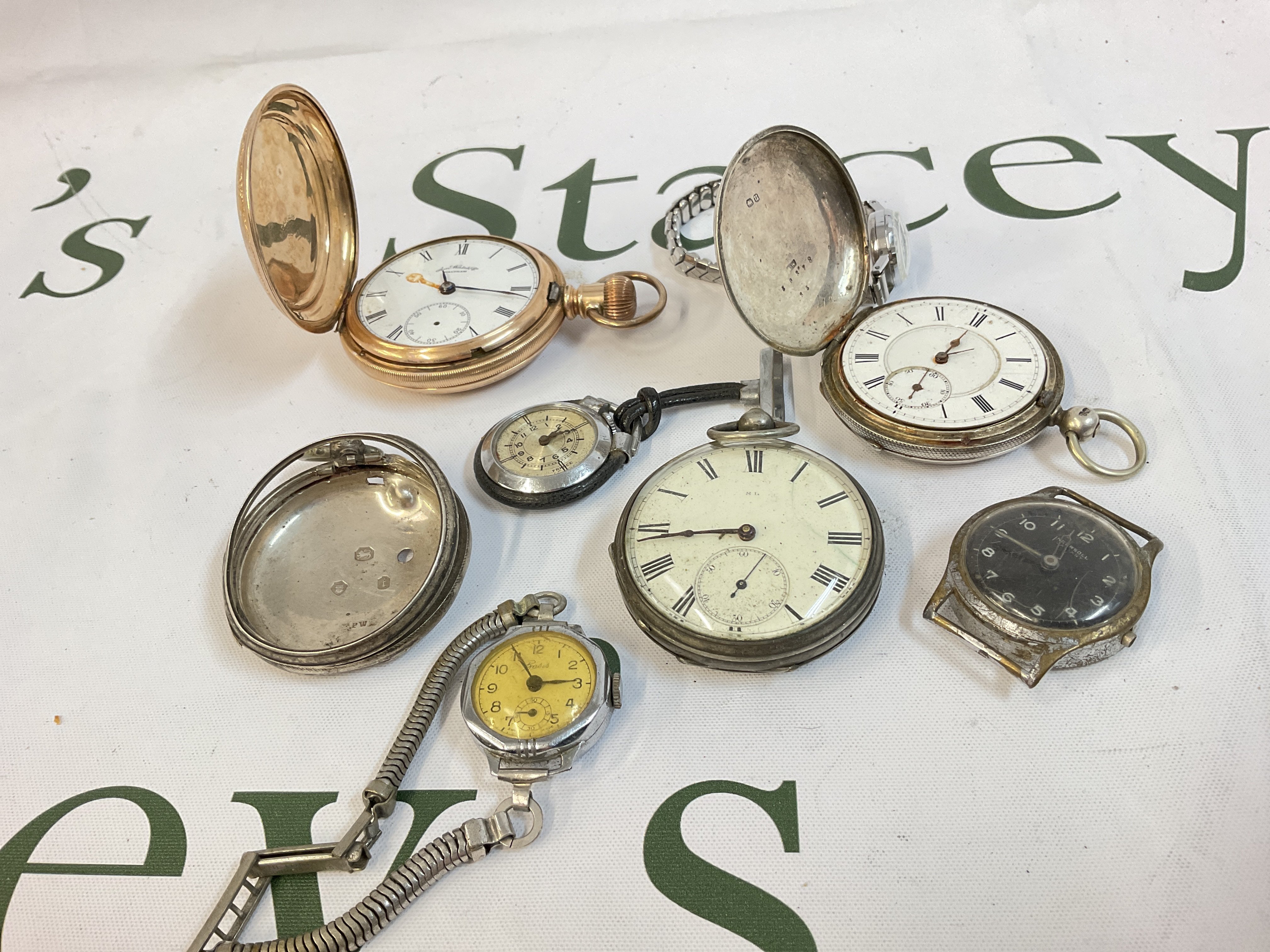 A collection of pocket watches including a Waltham and three silver hallmarked watches, Ingersoll watch with no strap etc