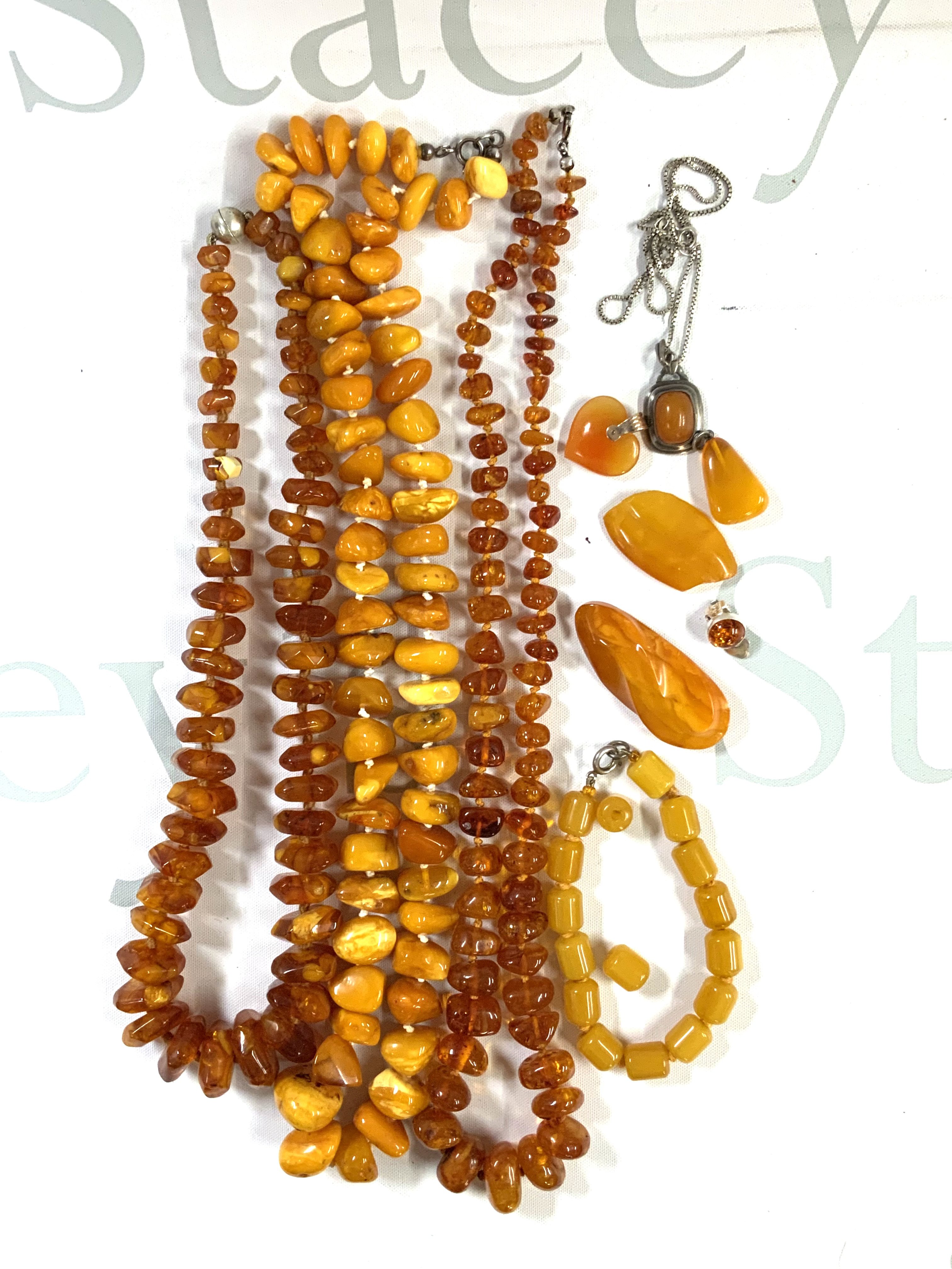 A collection of Amber beaded jewellery. (A)