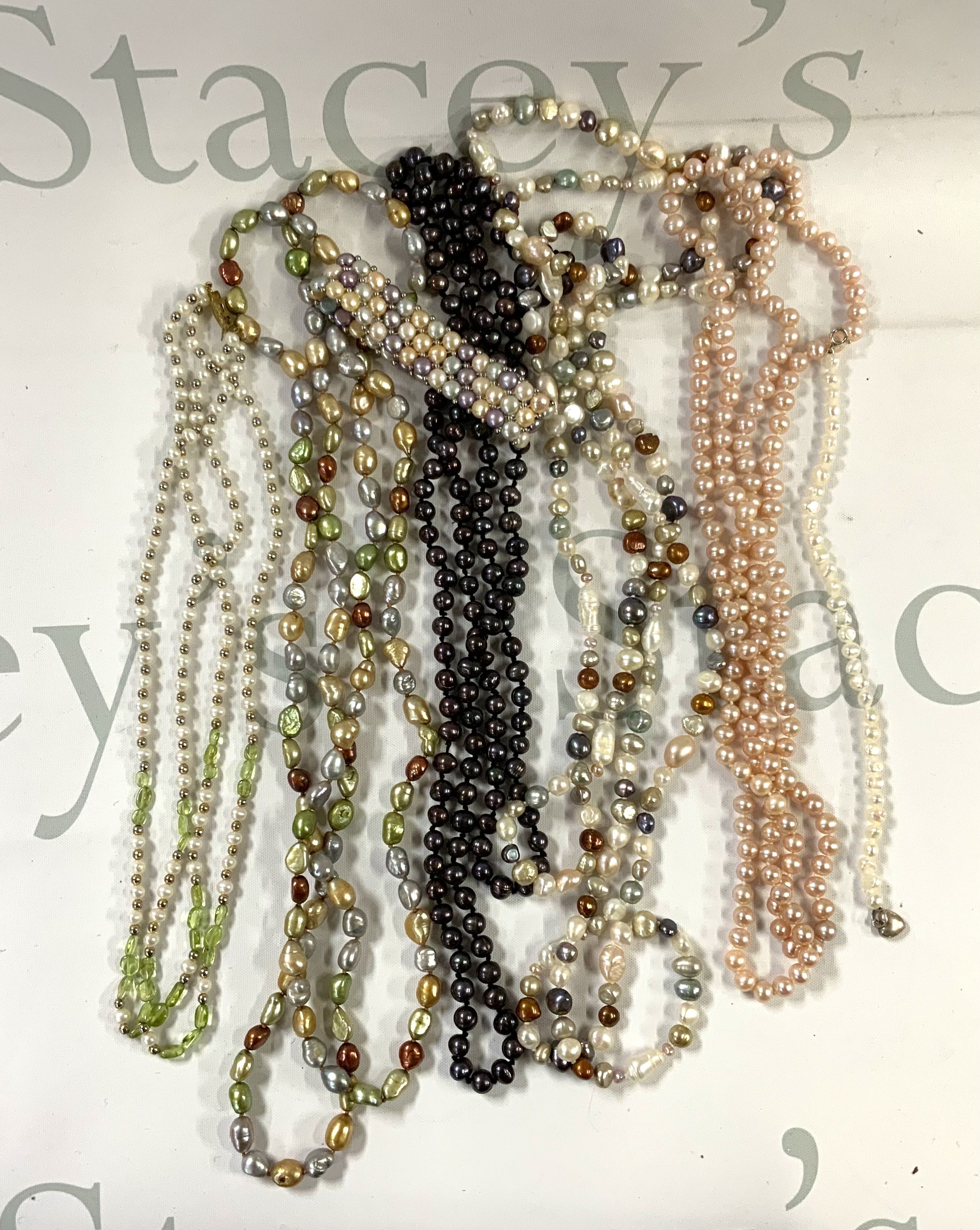 a collection of pearl jewellery