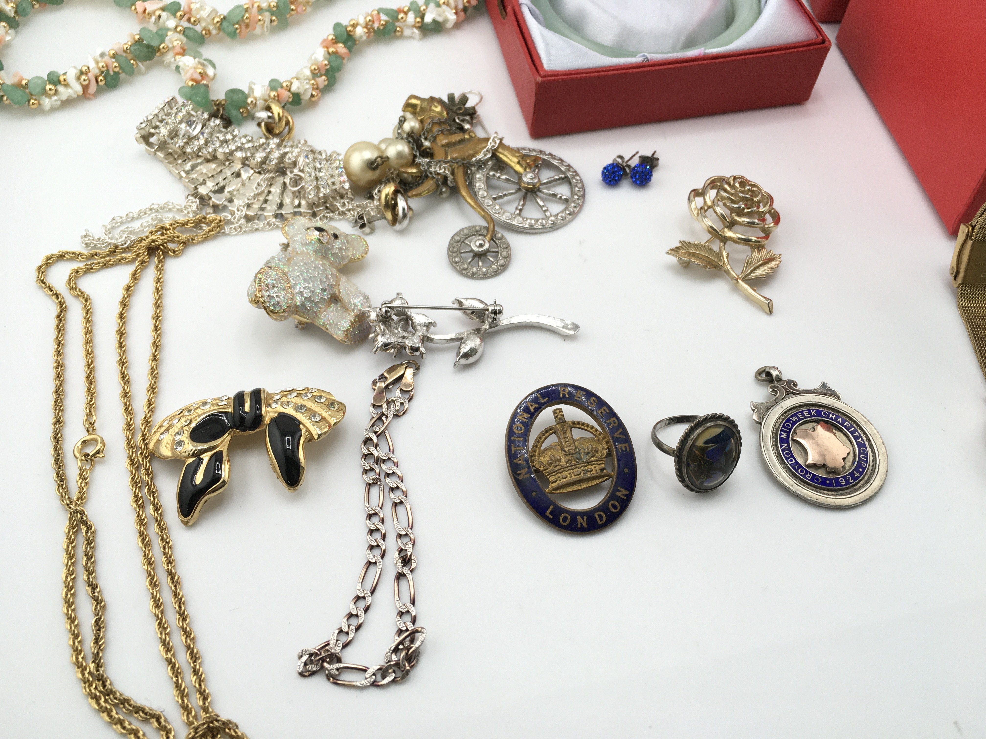 A collection of costume jewellery including a jade bangle and a cath kidston watch. Postage B. NO RESERVE