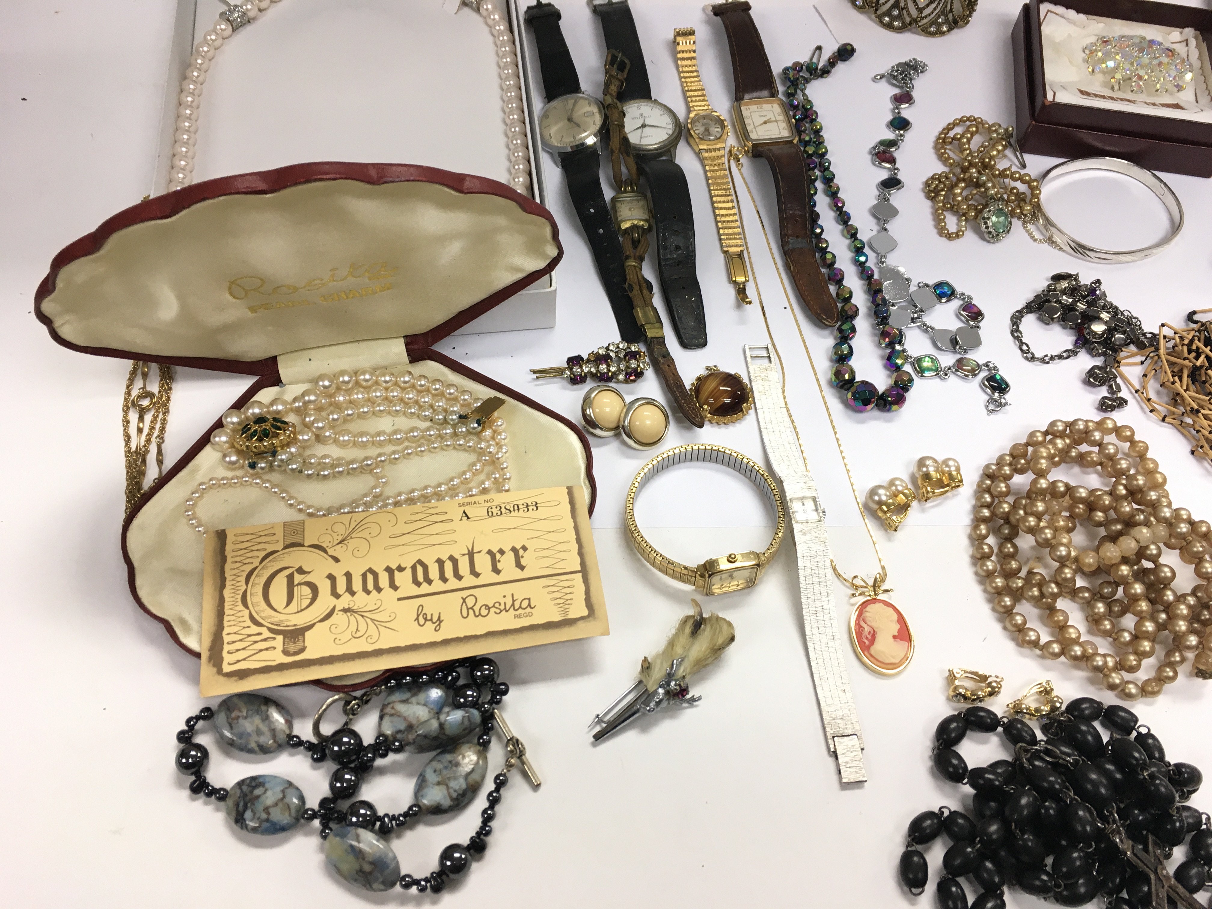 A collection of assorted costume jewellery including watches. Postage B. NO RESERVE