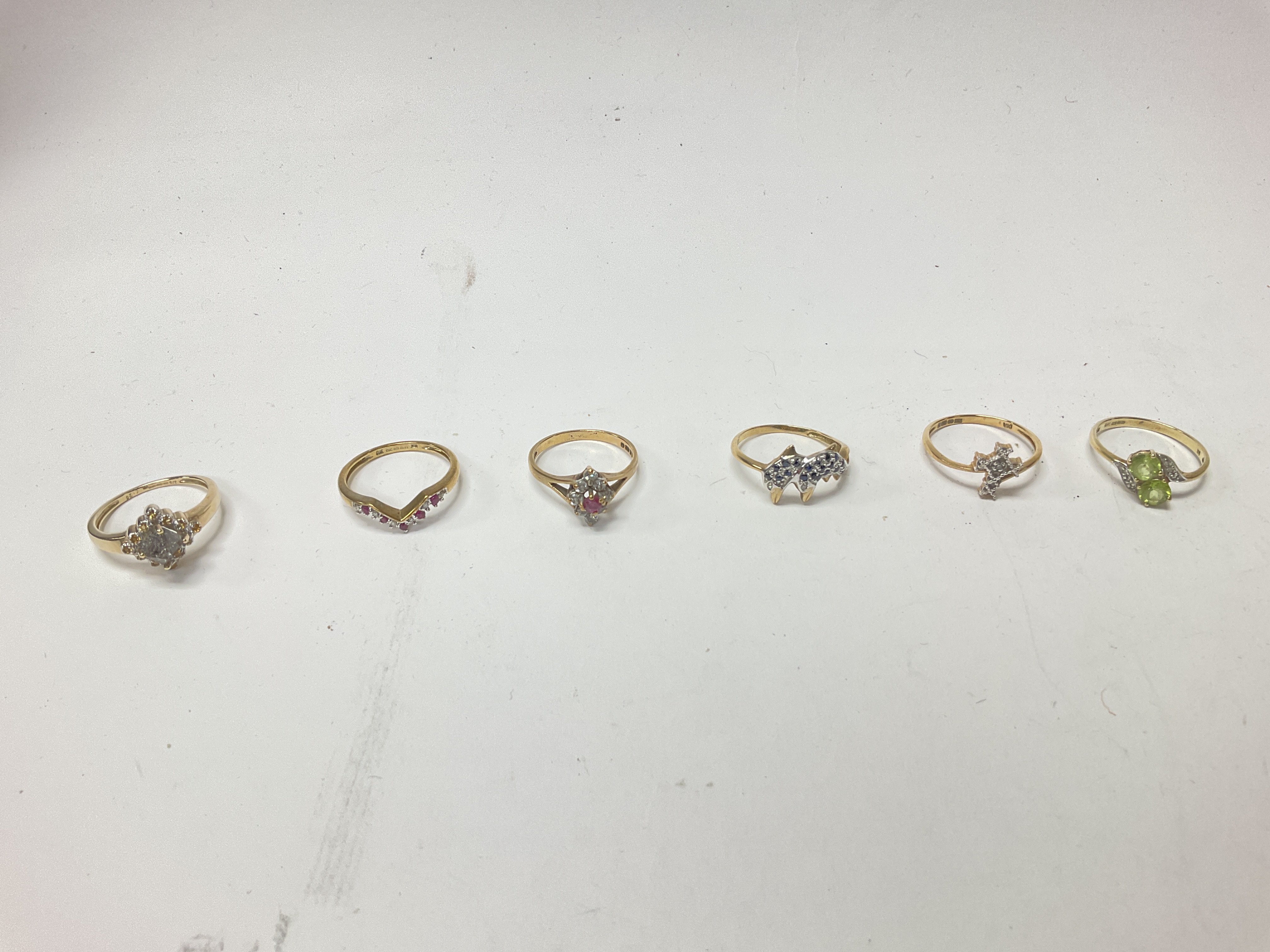 Six 9ct gold stone set rings, approx weight 11.31 grams